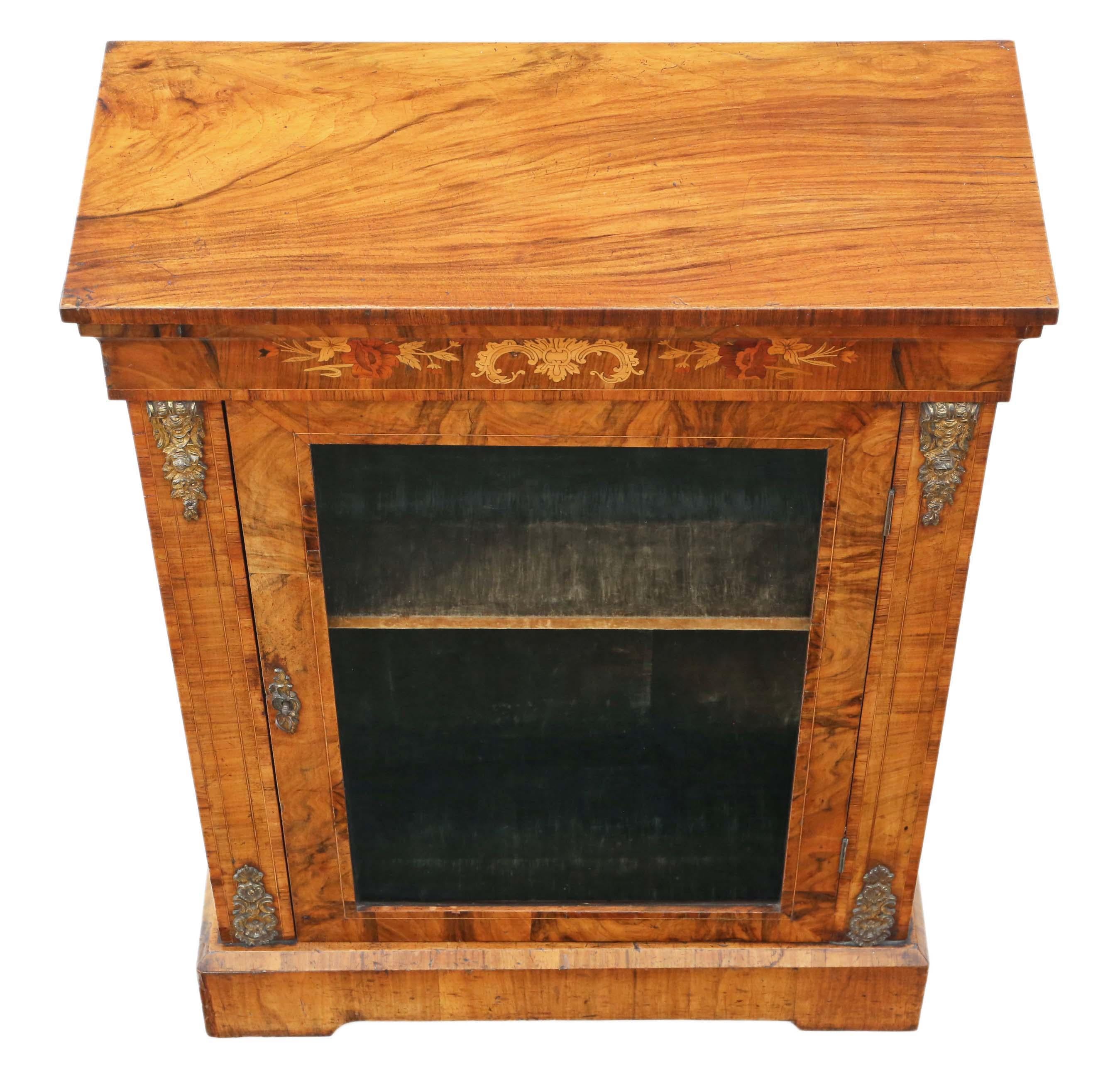 Antique quality inlaid burr walnut pier display cabinet C1880. The best colour and patina.

Solid and strong, with no loose joints. We have a key. Rare lift up lid with concealed storage compartment. Lovely marquetry inlay and ormolu brass