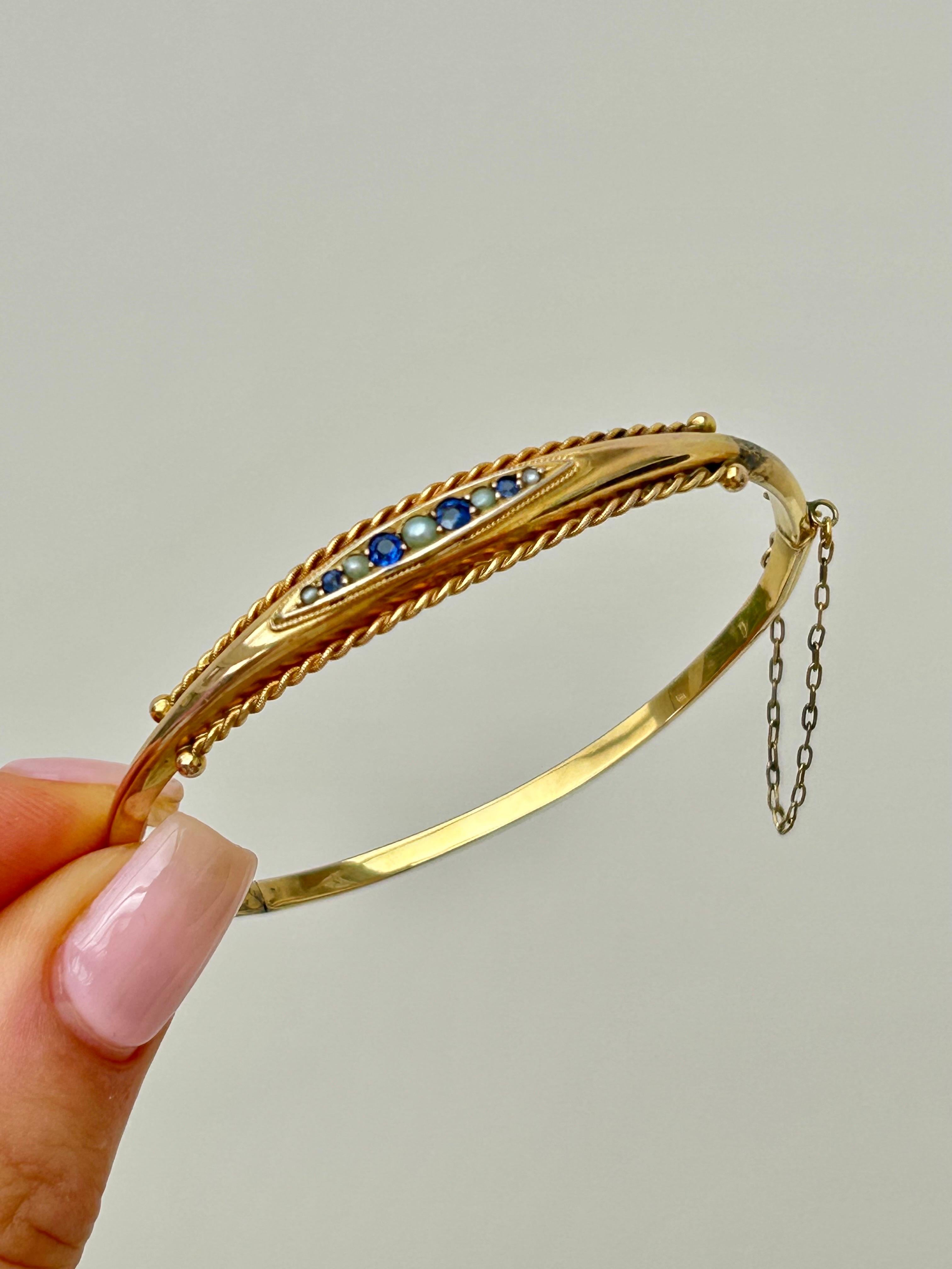 Late Victorian Antique C.1898 Sapphire and Pearl Bangle Bracelet in 9 Carat Yellow Gold For Sale