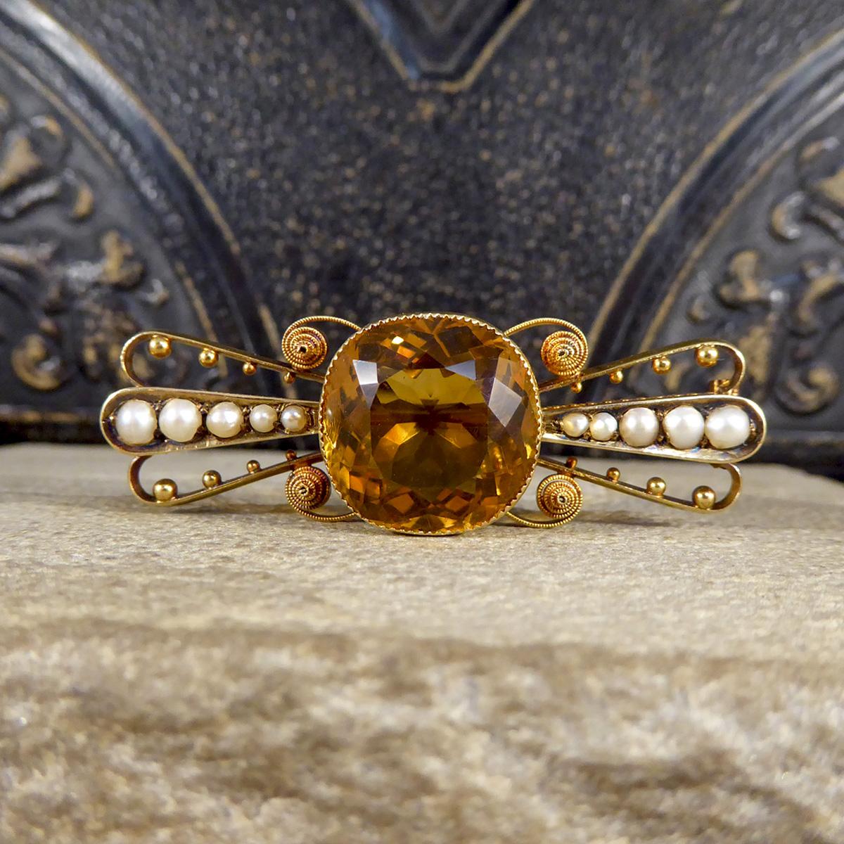 This gorgeous brooch is in such great condition and has been crafted in the Late Victorian/Early Edwardian era. In the centre of the brooch sits a quality Citrene weighing over 16ct and giving brilliant bright and burnt orange colours with little to