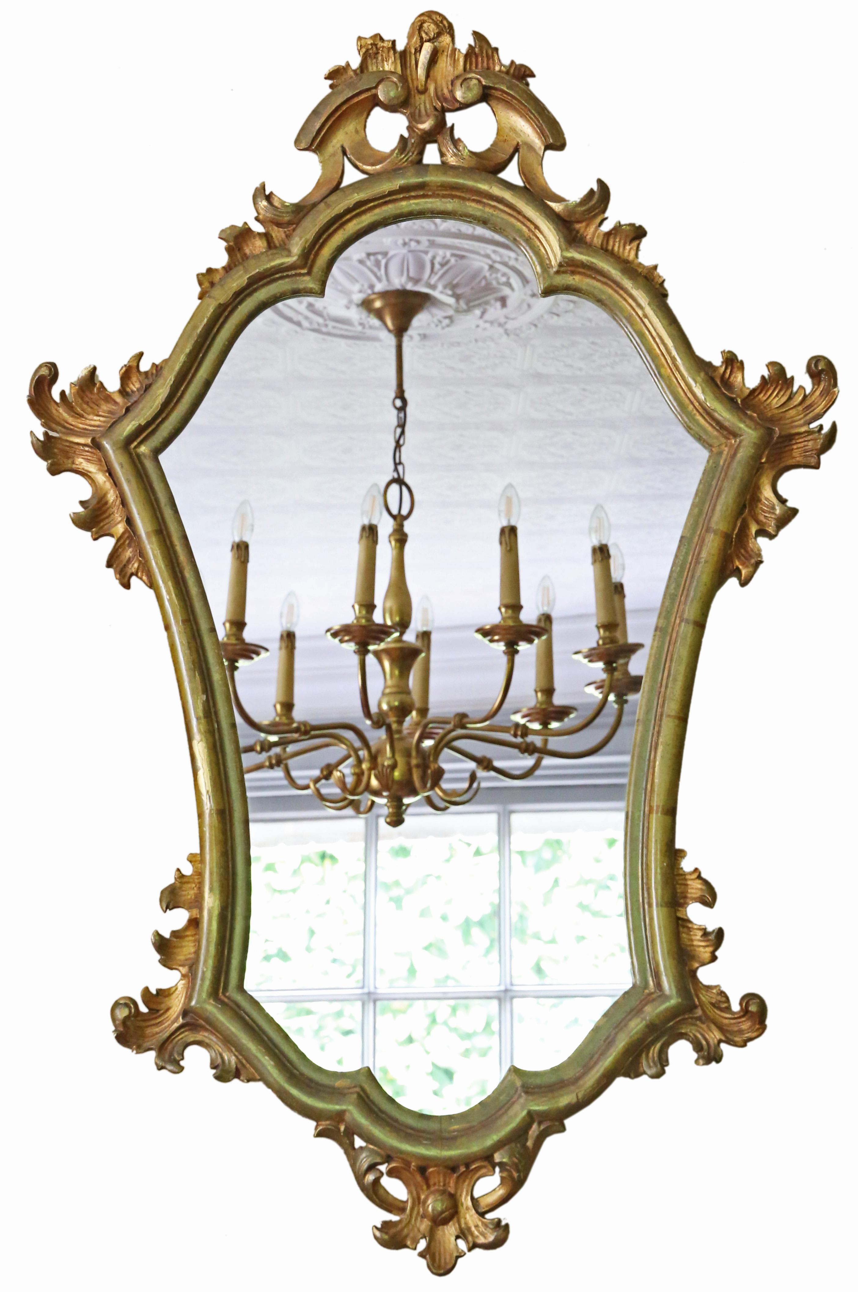 Antique Mirror da parete in legno dorato del C1900 - Design ornato di alta qualità.

Questo specchio è caratterizzato da un design sorprendente che lo rende un'aggiunta accattivante a qualsiasi spazio adatto. Il telaio è solido, senza giunture