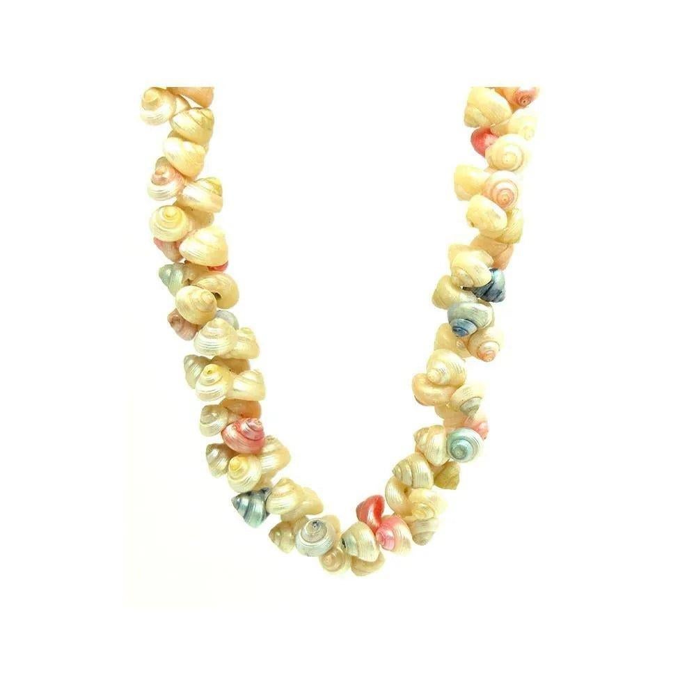 This charming antique Victorian necklace features natural pearl shell beads, delicately dyed in soft pastel shades of pink, blue, peach, and cream. These petite spiral shells catch the light beautifully, creating an iridescent glow that complements