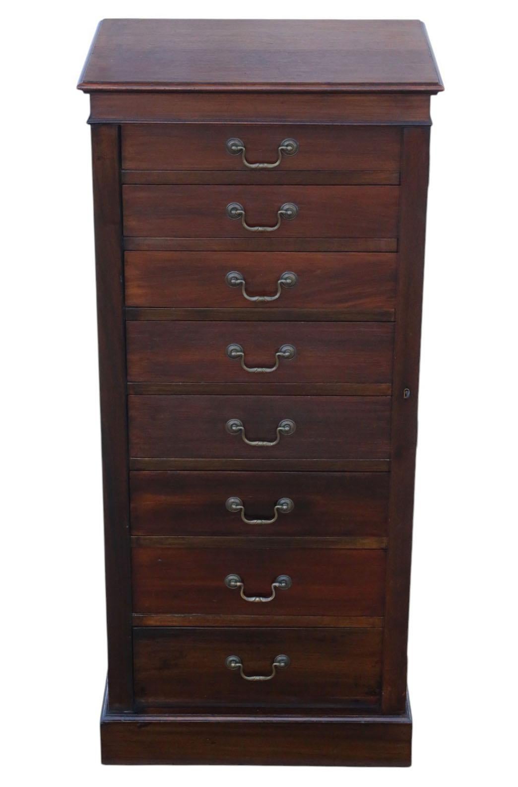 Antique c.1915 Mahogany Wellington Chest of 8 Drawers – Fine Quality

A fine mahogany Wellington chest, dating from circa 1915. With its elegant clean lines and warm patina, this tall chest offers both decorative appeal and practical storage across
