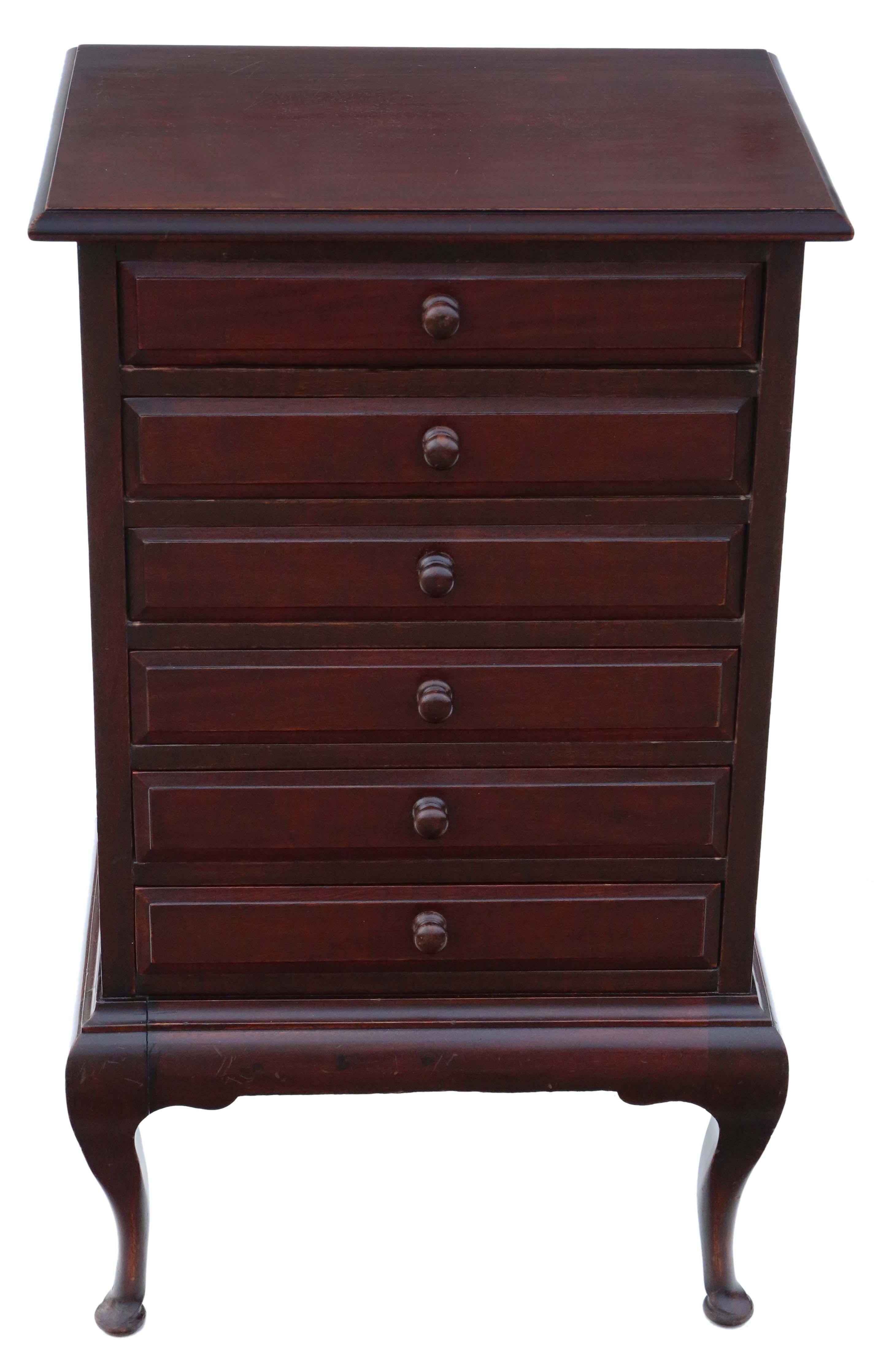 Antique C1920 6 drawer mahogany music chest cabinet cupboard.

This is a lovely item, that is full of age, charm and character. Top drawer is a traditional, the remainder have drop down fronts, typical of music chests (for sheet music).

Solid, with