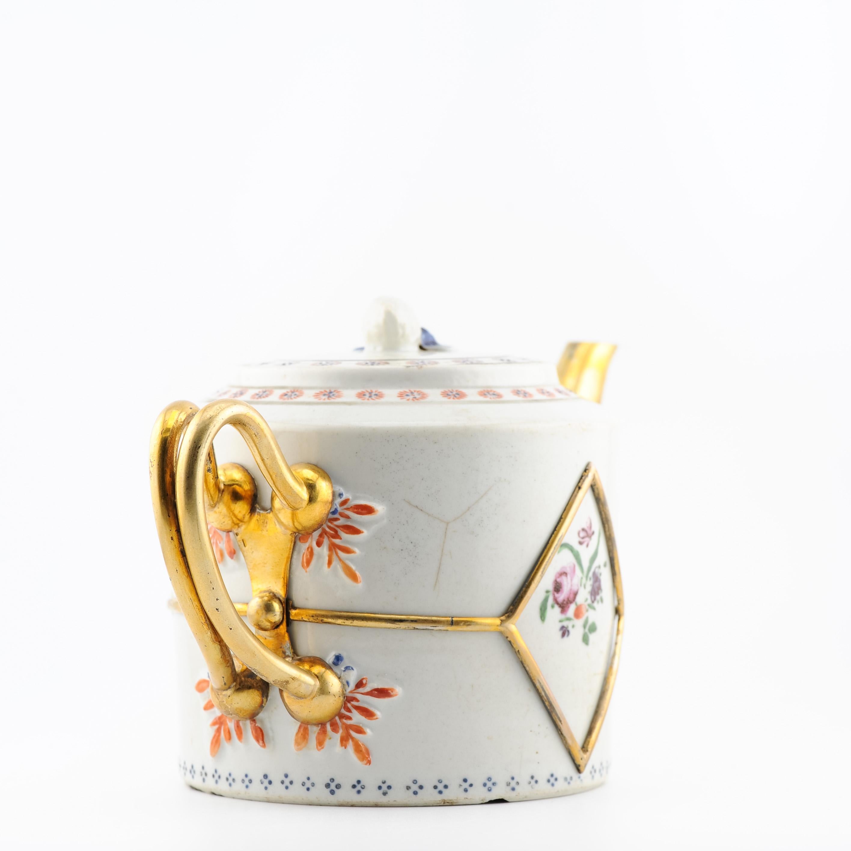 A very nicely decorated teapot. Jiaqing period. Great decoration in Famille Rose. The pot itself is nice already but the restoration of the handle and the spout are truly amazing.

They are done in gold, never seen like this