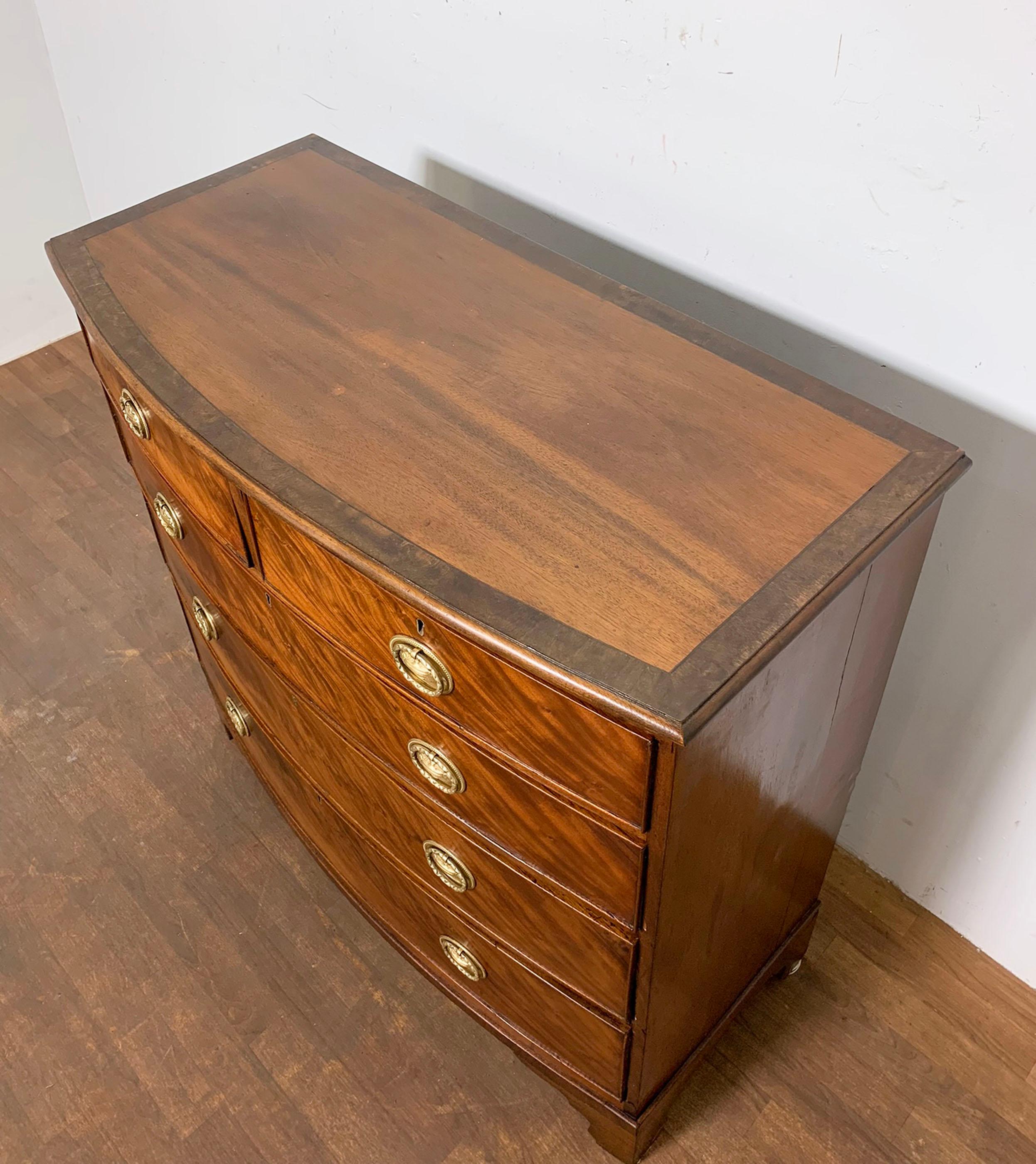 British Antique Ca. 1800 English Bow Front Chest in Flame Mahogany