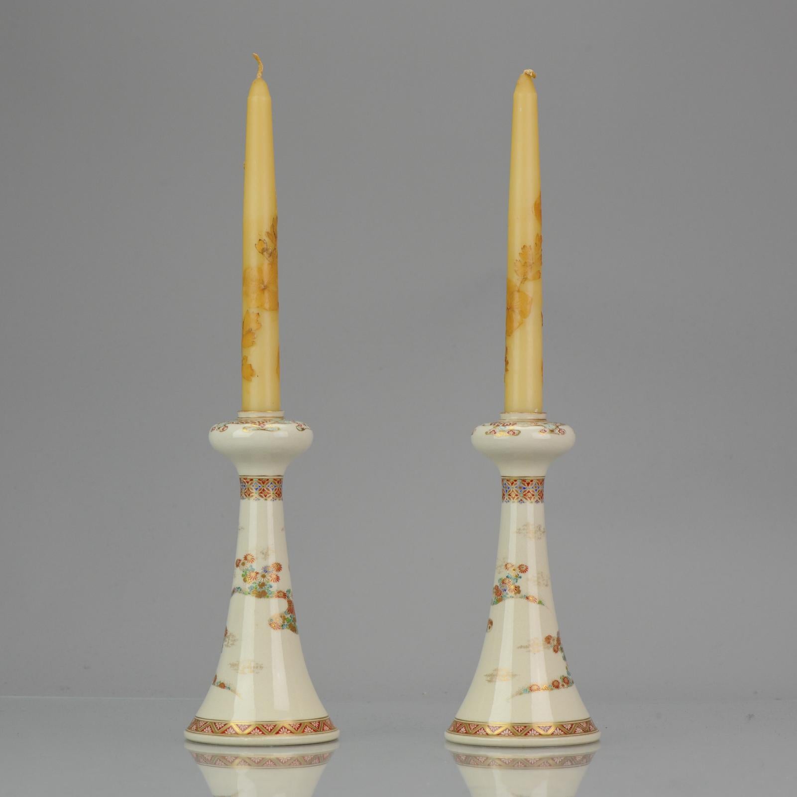 Description
Sharing with you is this nice pair of Japanese Satsuma candle holders, Obiyama, Meiji/Taisho period. Absolute top quality pieces.
With bulbous garlic head tops above tapering bases, sparsely decorated with flowers and foliage, together
