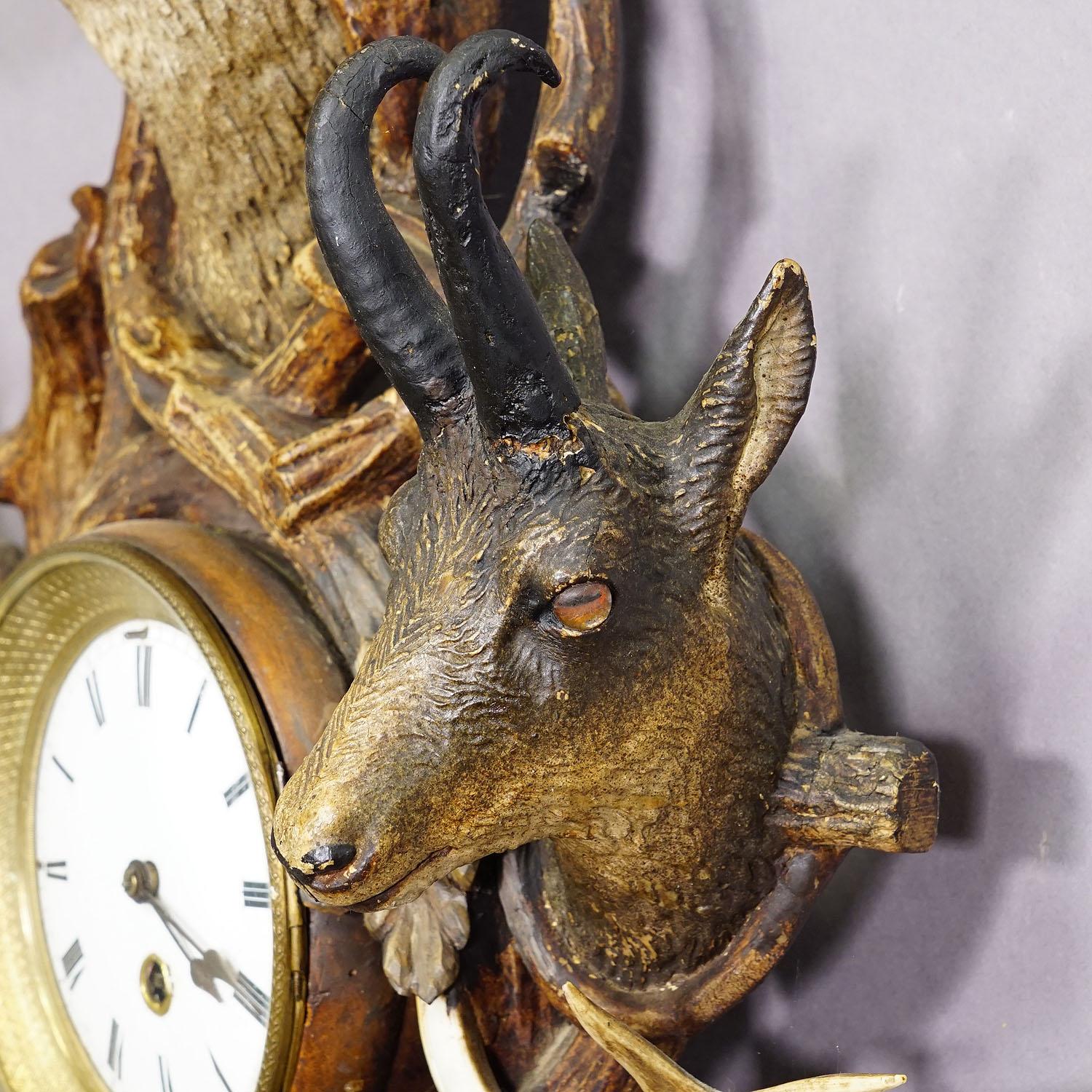 Austrian Antique Cabin Antler Wall Clock with Deer and Chamois Austria ca. 1900 For Sale