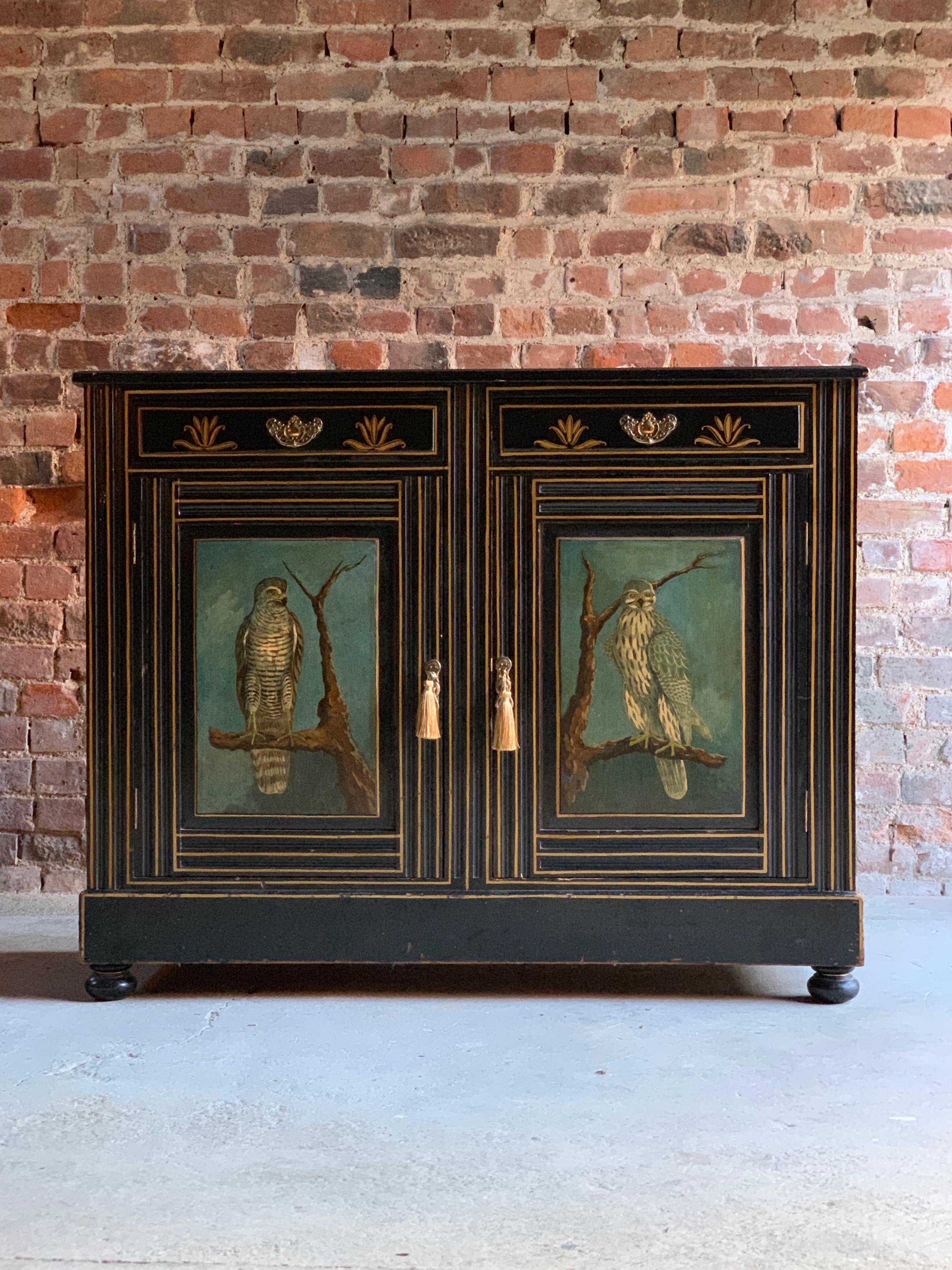 A magnificent Victorian19th century hand painted side cabinet circa 1890, overall painted with birds of prey and other fowl, the rectangular top above two frieze drawers and two panelled cupboard doors, raised on bun feet.

Condition report: The