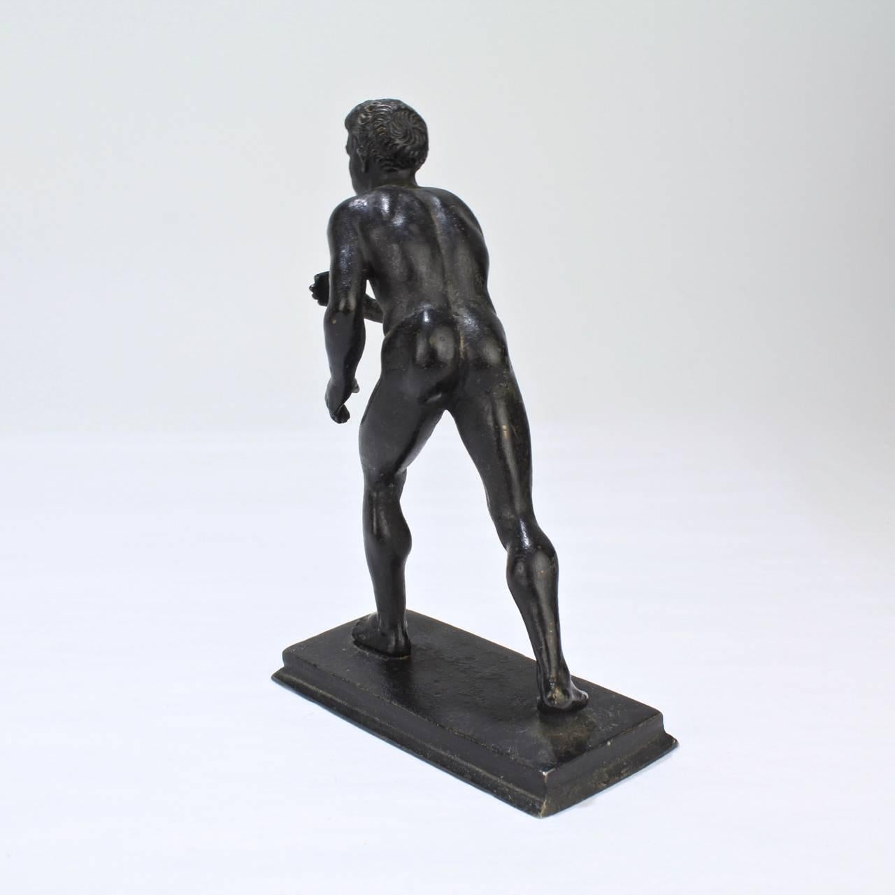 A good cabinet-sized Grand Tour bronze sculpture of the Herculaneum runner.

Cast after the Roman model in the Vila of the Papyri (Herculaneum). 

With a rich, near-black patina to the surface.

Provenance: From the estate of George Lucas of