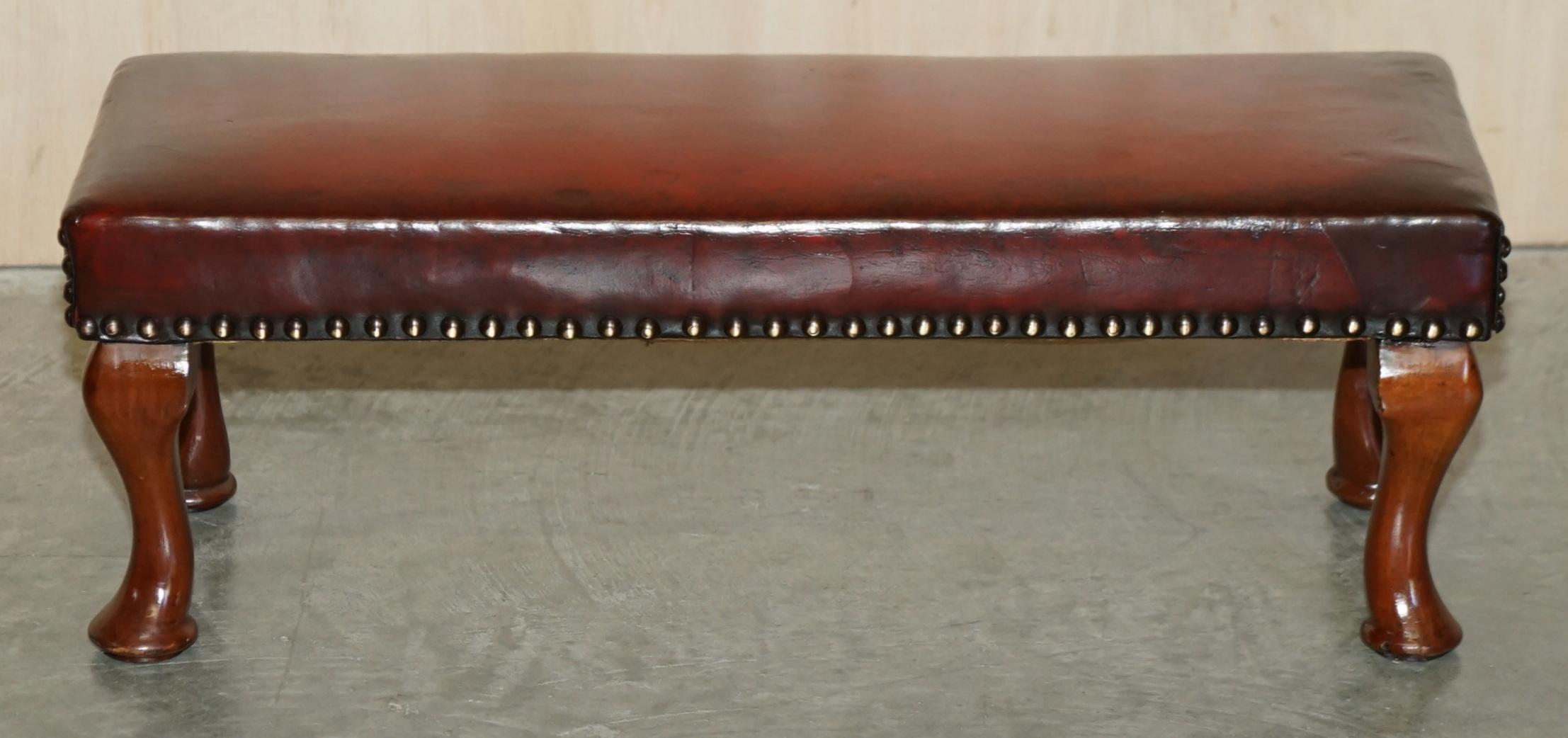 We are delighted to offer for sale this stunning, fully restored hand dyed Bordeaux leather footstool.

A very good looking and well-made stool, it has been upholstered with high grade premium cattle hide leather which has been hand dyed this nice