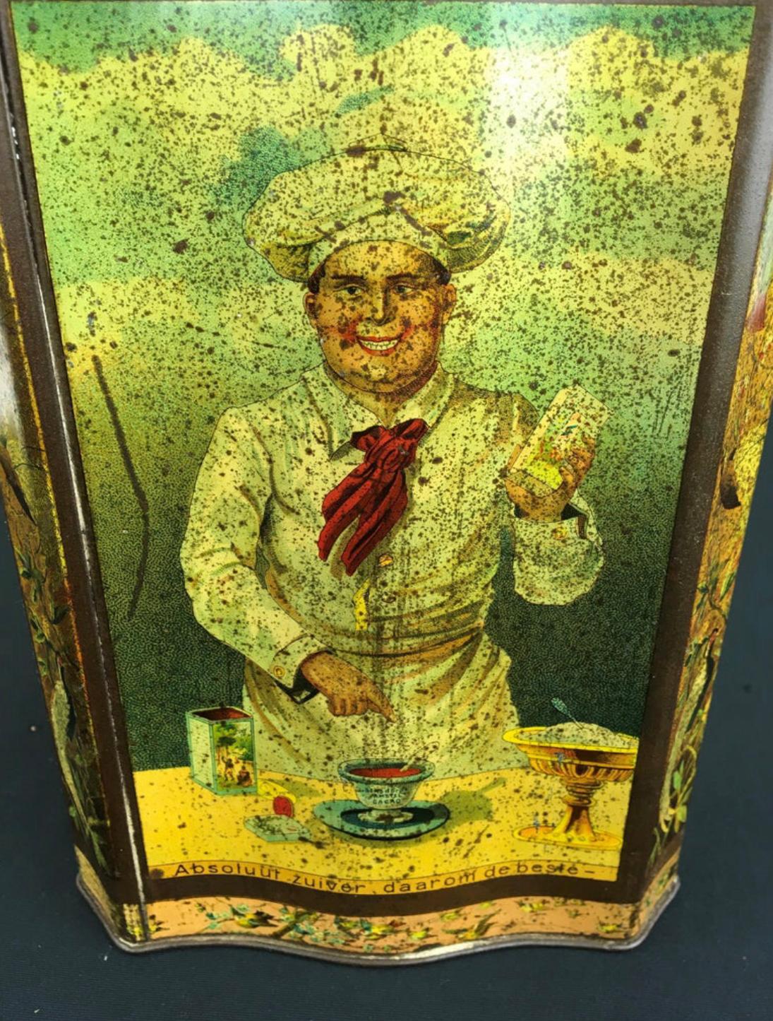 Antique cacao tin with Chef from the Netherlands. 
This antique lithographic tin was made for Prima Bensdorp Cacao Amstel Amsterdam. It dates circa 1890-1910 ! 
It's a rectangular tin with beautiful litho scenes: 
cocoa plantation with pickers