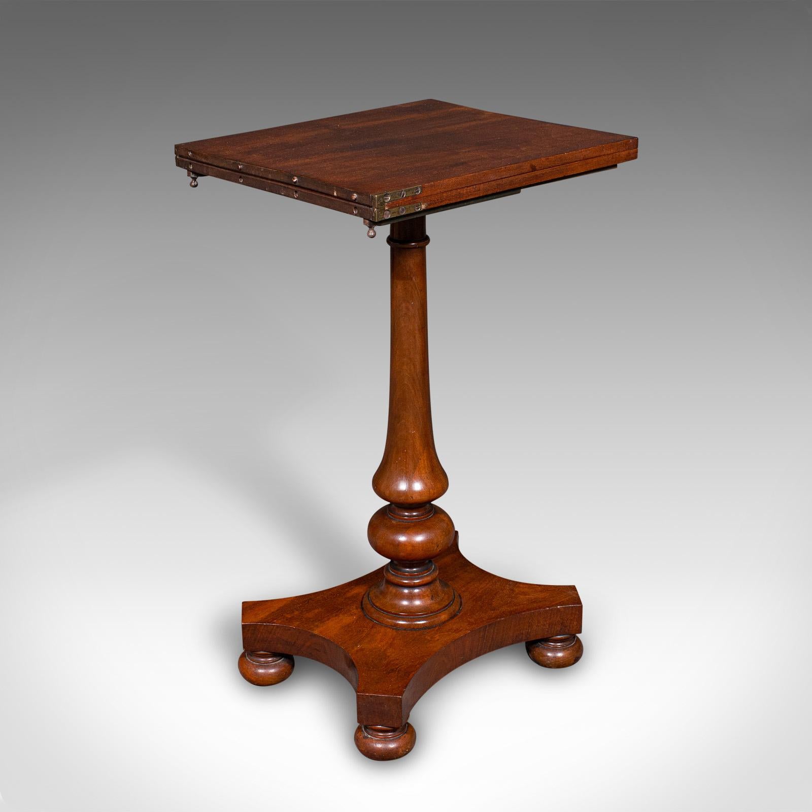 This is an antique calligrapher's extending table. An English, mahogany cantilever chairside or wine table, dating to the Regency period, circa 1820.

Fascinating metamorphic table with wonderful craftsmanship
Displays a desirable aged patina and in