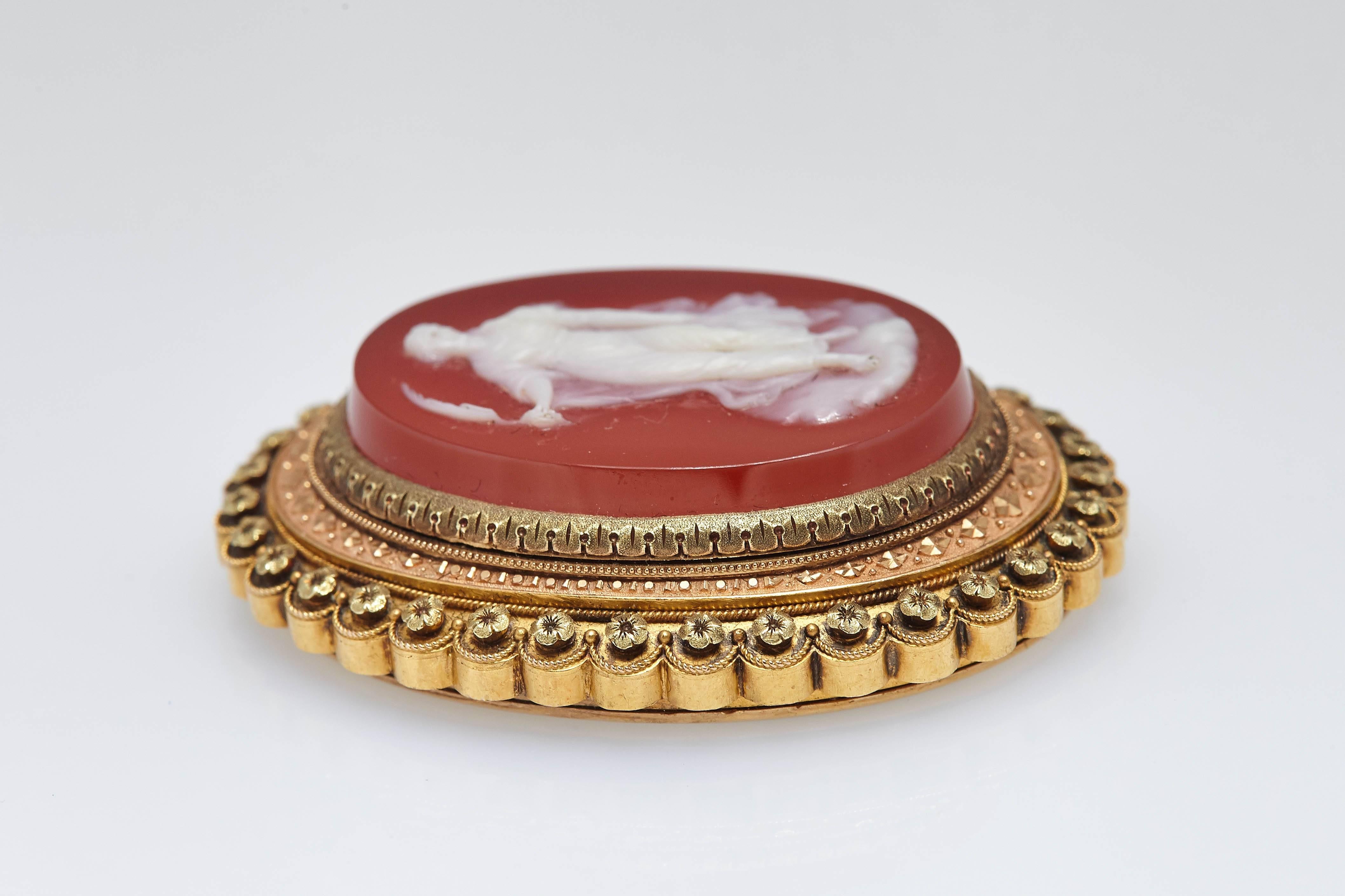 A refined antique agate cameo brooch mounted on gold, representing a female figure. Made in Southern Italy, circa 1880. 