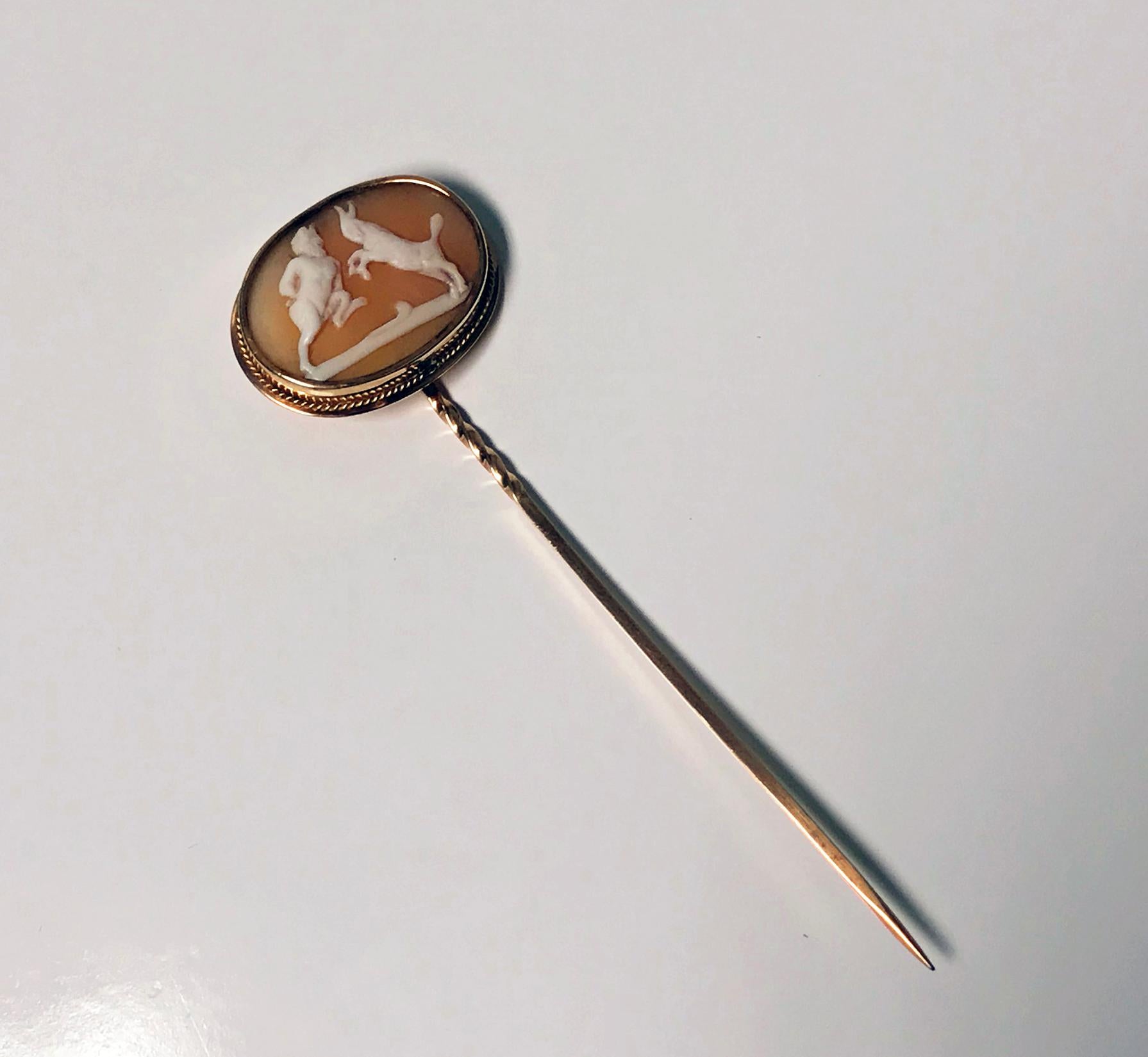 Fine Antique Cameo Stickpin mounted in 15K (acid tested) rose Gold, C.1875. The shell cameo well carved depicting a Satyr sparring with a Goat, oval shape the surround gold bezel with fine rope border. Length: 3.5 inches. Cameo itself measures: