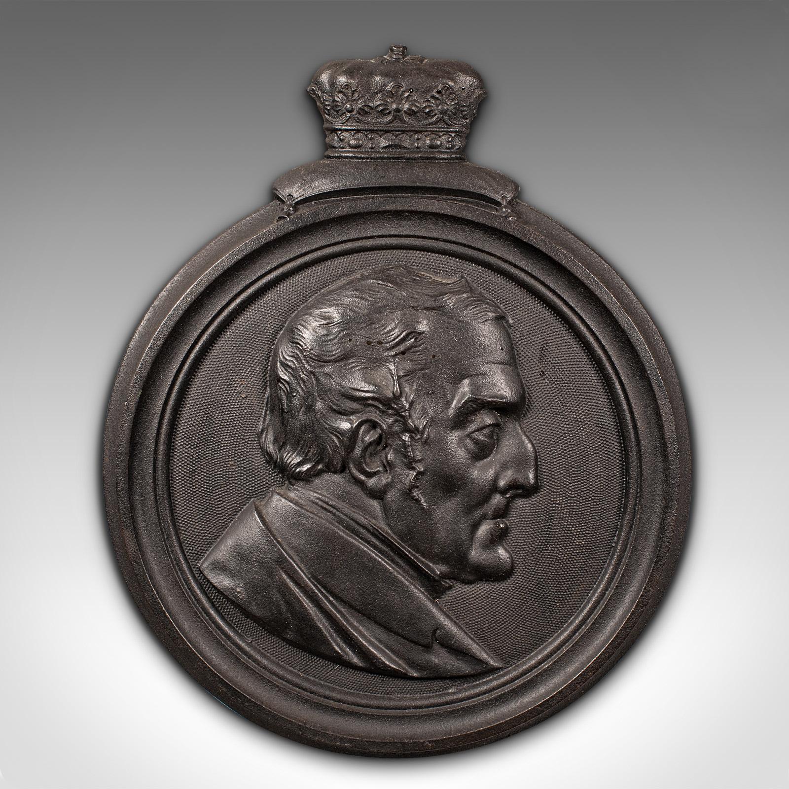 This is an antique cameo wall plaque. An English, cast iron portrait of the 1st Duke of Wellington, dating to the Victorian period, engraved 1854.

Arthur Wellesley (1769 - 1852) was the first Duke of Wellington from 1814 until his death, when the