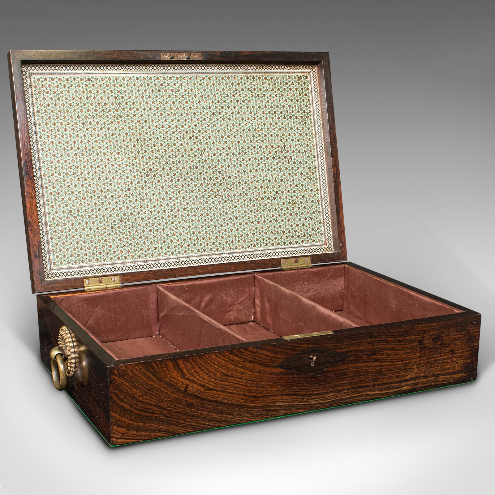 This is an antique campaign correspondence box. An Indian, rosewood and Sadeli mosaic colonial writing case, dating to the Regency period, circa 1820.

Delightfully attractive box, with copious details and quality finishes
Displaying a desirable