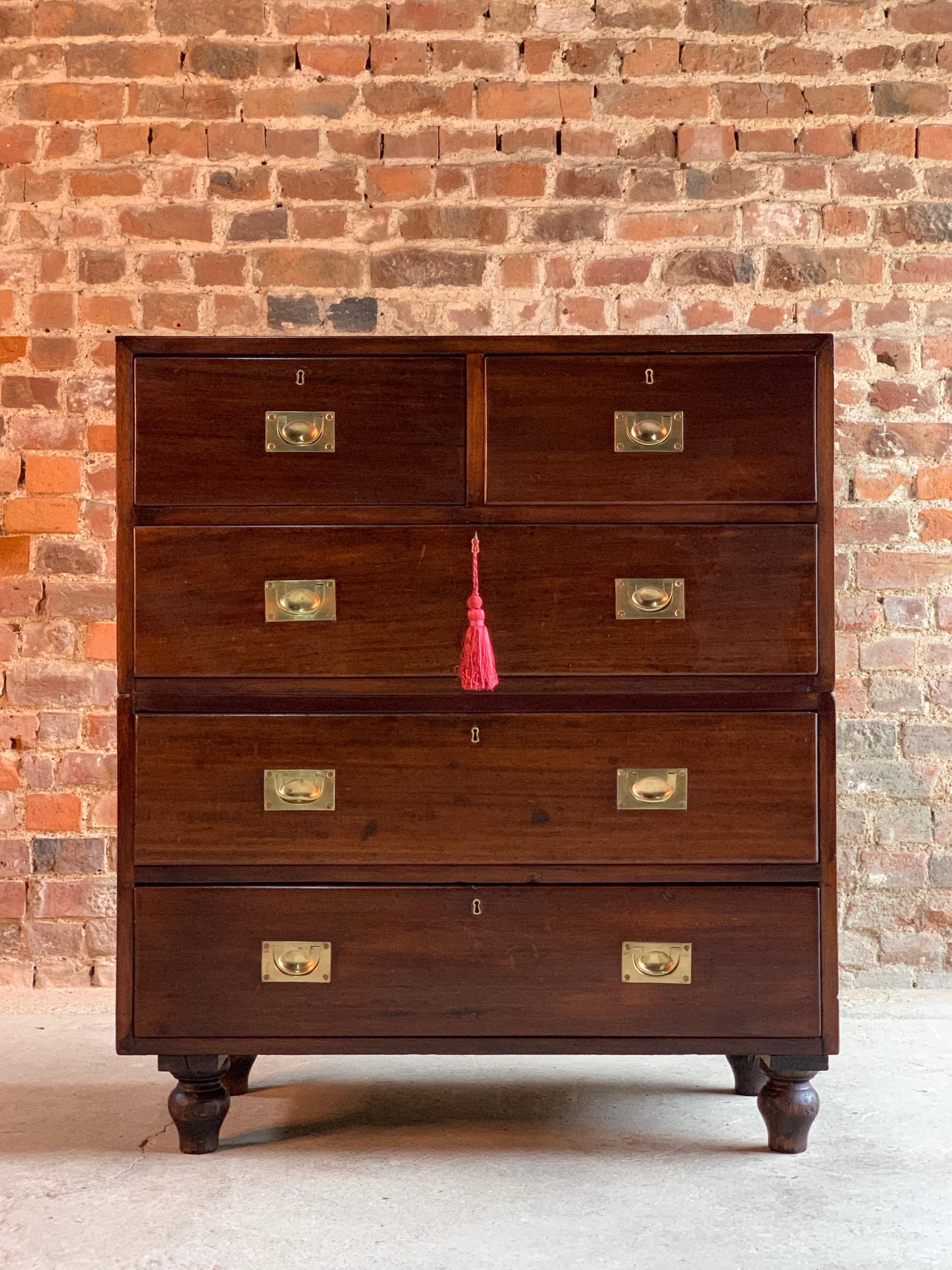Antique Campaign teak chest of drawers 19th century military circa 1890 No: 31

A 19th century military campaign teak chest of drawers circa 1890, the rectangular top over two short and three longer graduated drawers, all fitted with campaign