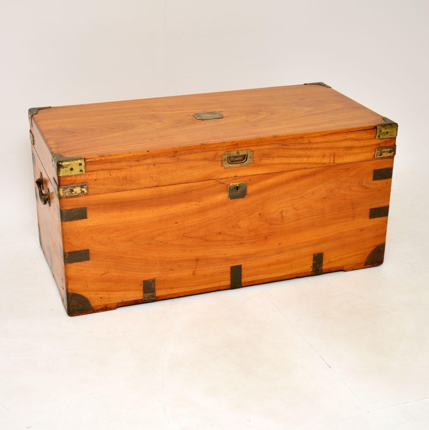 An excellent antique military campaign chest in camphor wood and brass. This was made in England, it dates from around the 1860-1880 period.

It is very well made, and is as good an example as you are likely to see. The brass mounts are of