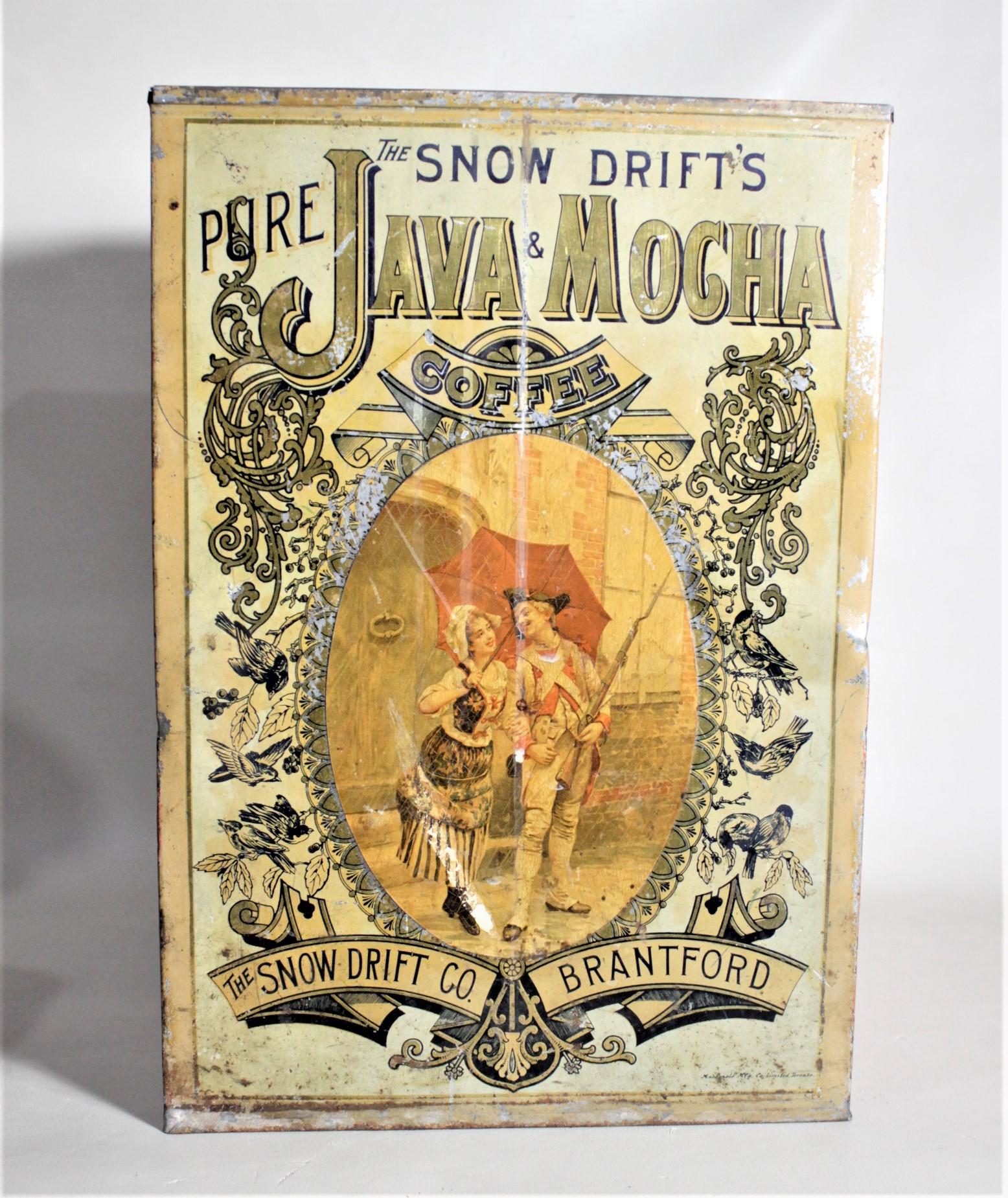 This antique general store advertising store display tin for Java Mocha coffee is presumed to have been made in Canada in approximately 1880 in the period Victorian style. The tin advertises 