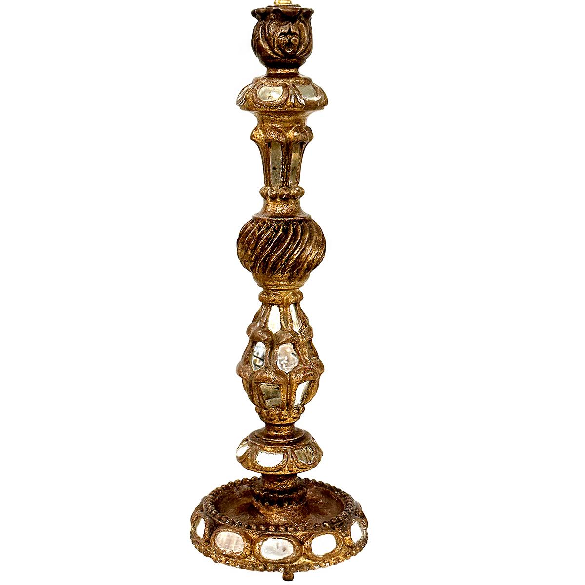 A circa 1920's Spanish candlestick lamp with mirror insets.

Measurements:
Height of body: 27