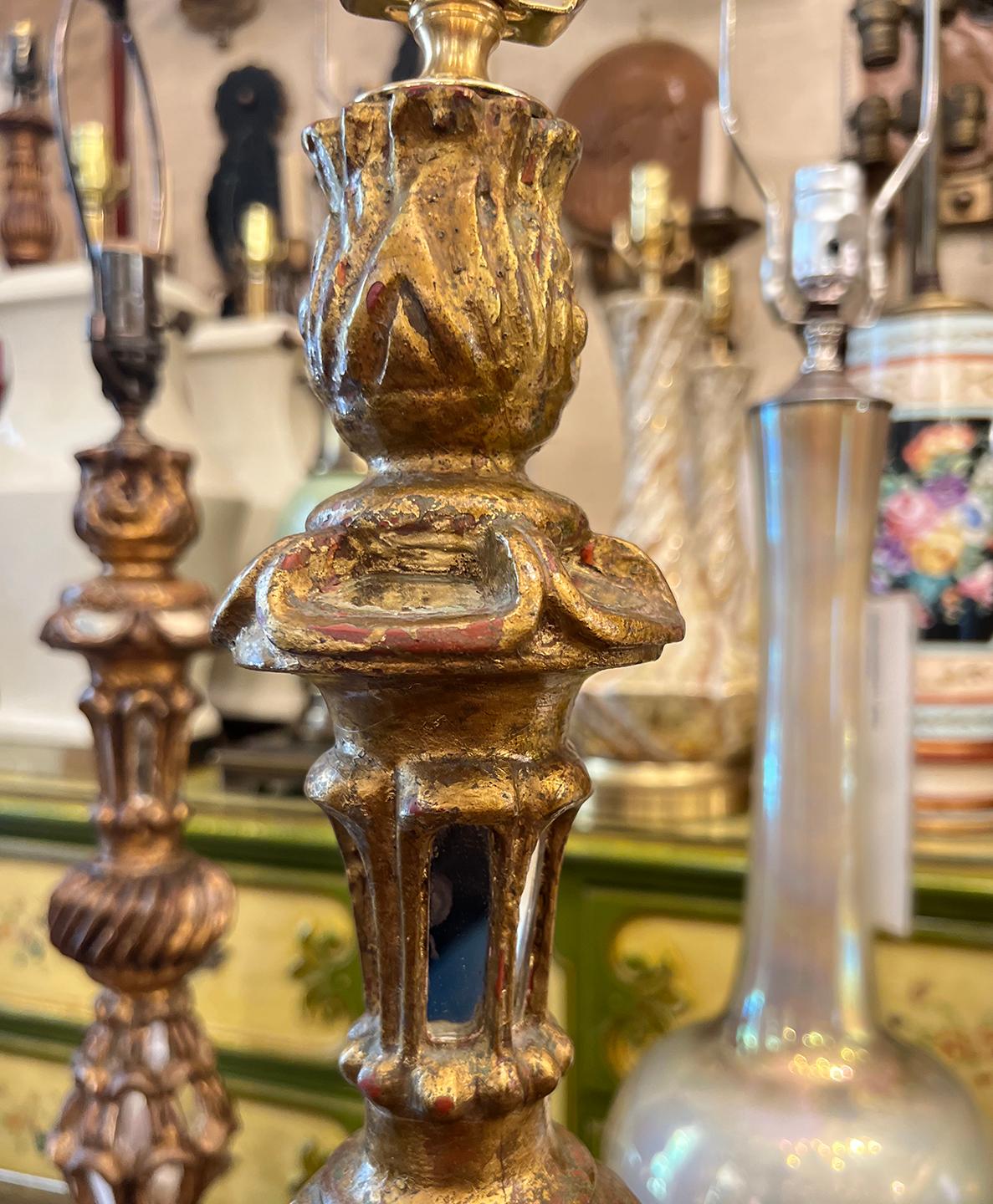 A circa 1920's Spanish candlestick lamp with mirror insets.

Measurements:
Height of body: 23″
Height to shade rest: 33.25″
Diameter (base): 8″