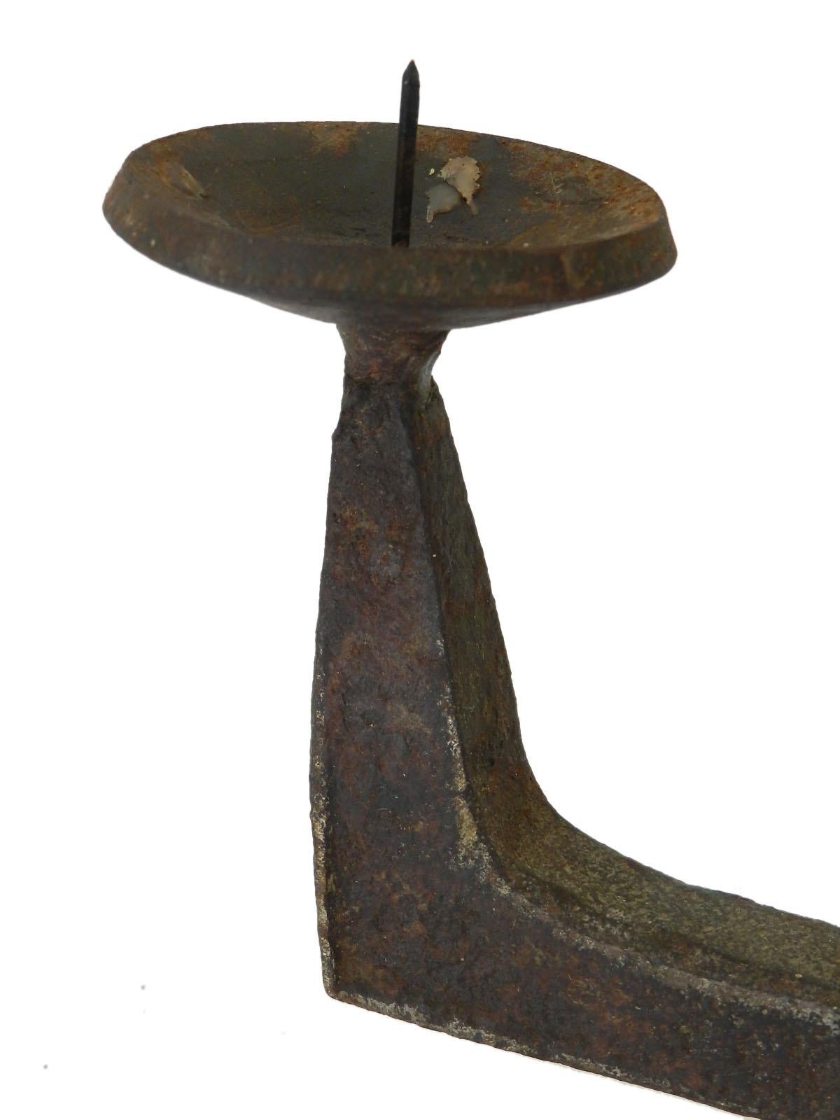 Forged Iron primitive candlestick brutalist, French, circa 1690
Great age patina
Simple French Provincial Folk Art
Good antique condition with some small remains of wax in the bowls.





   