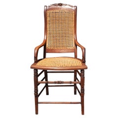 Antique Cane and Carved Wood Arm Side Chair with Rose Detail