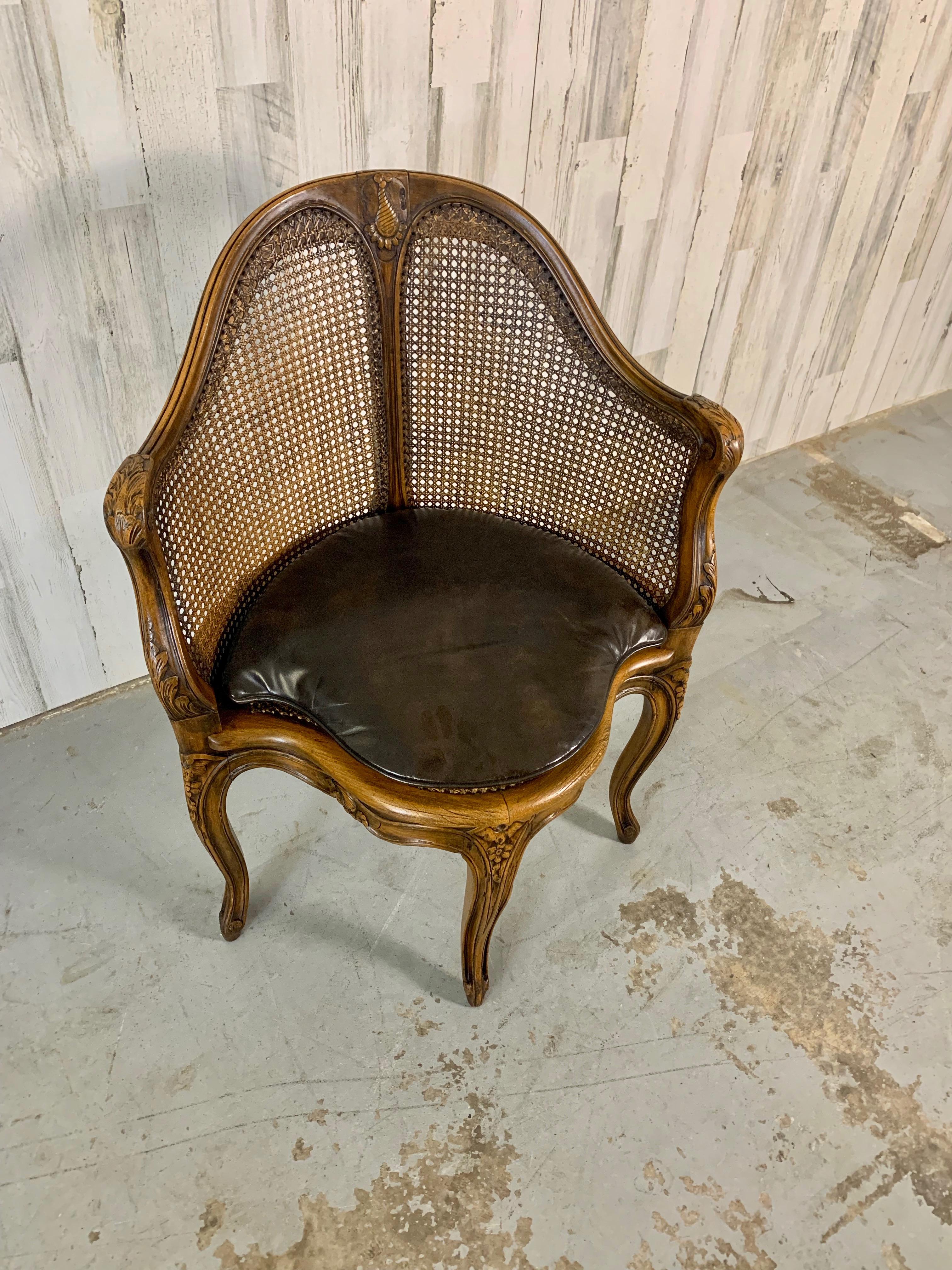 Hand carved curved beechwood French corner chair with blind hole cane and removable cushion. Please see pictures of the fire breathing salamander with crown stamped on the bottom.
