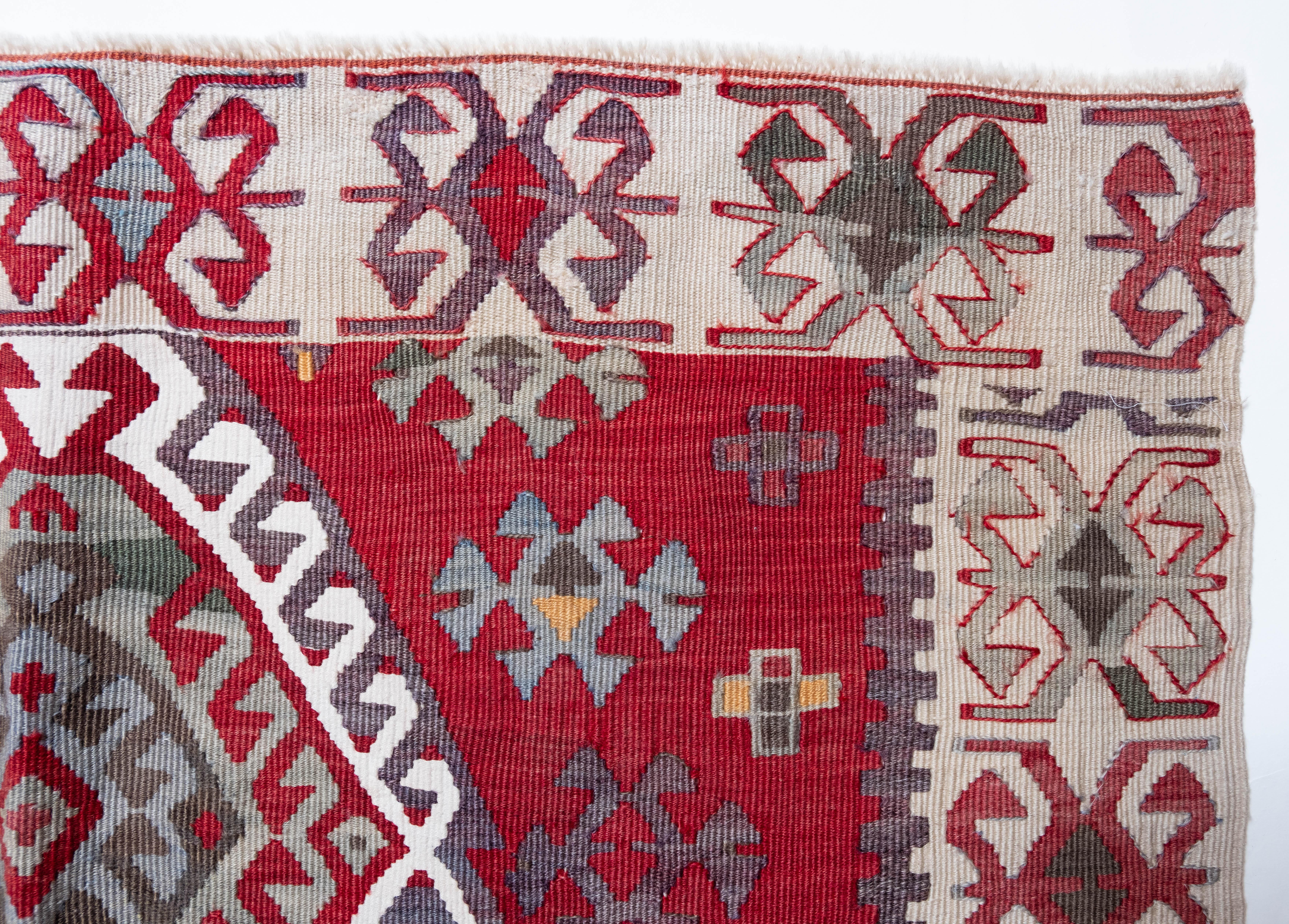 This is Central Anatolian Antique Mihrab Kilim, from the Cankiri region with a rare and beautiful color composition.

This highly collectible antique kilim has wonderful special colors and textures that are typical of an old kilim in good condition.