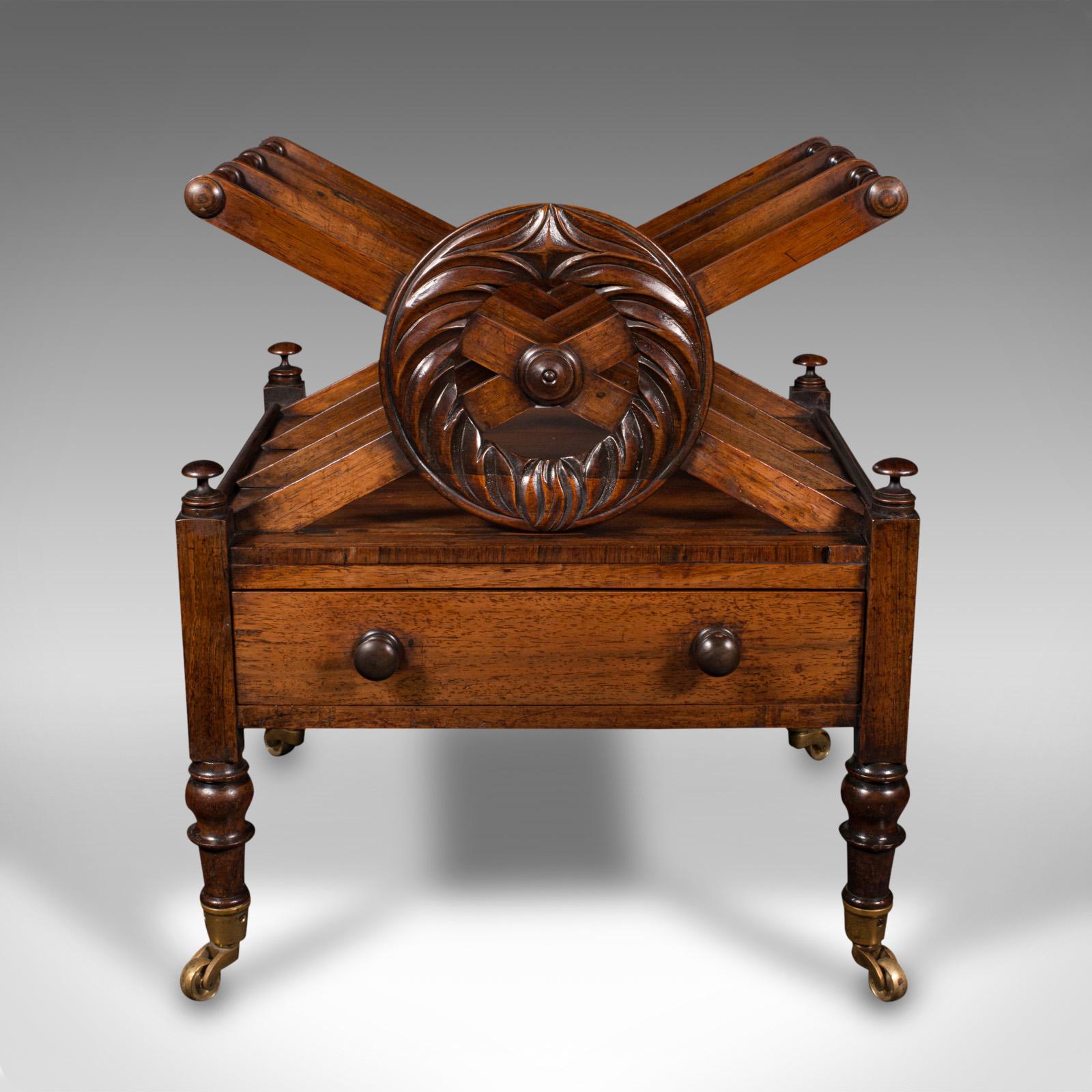 This is an antique Canterbury. An English, rosewood three sectioned magazine stand or newspaper rack, dating to the Regency period, circa 1820.

Wonderful craftsmanship, adding distinction to any room
Displays a desirable aged patina and in good