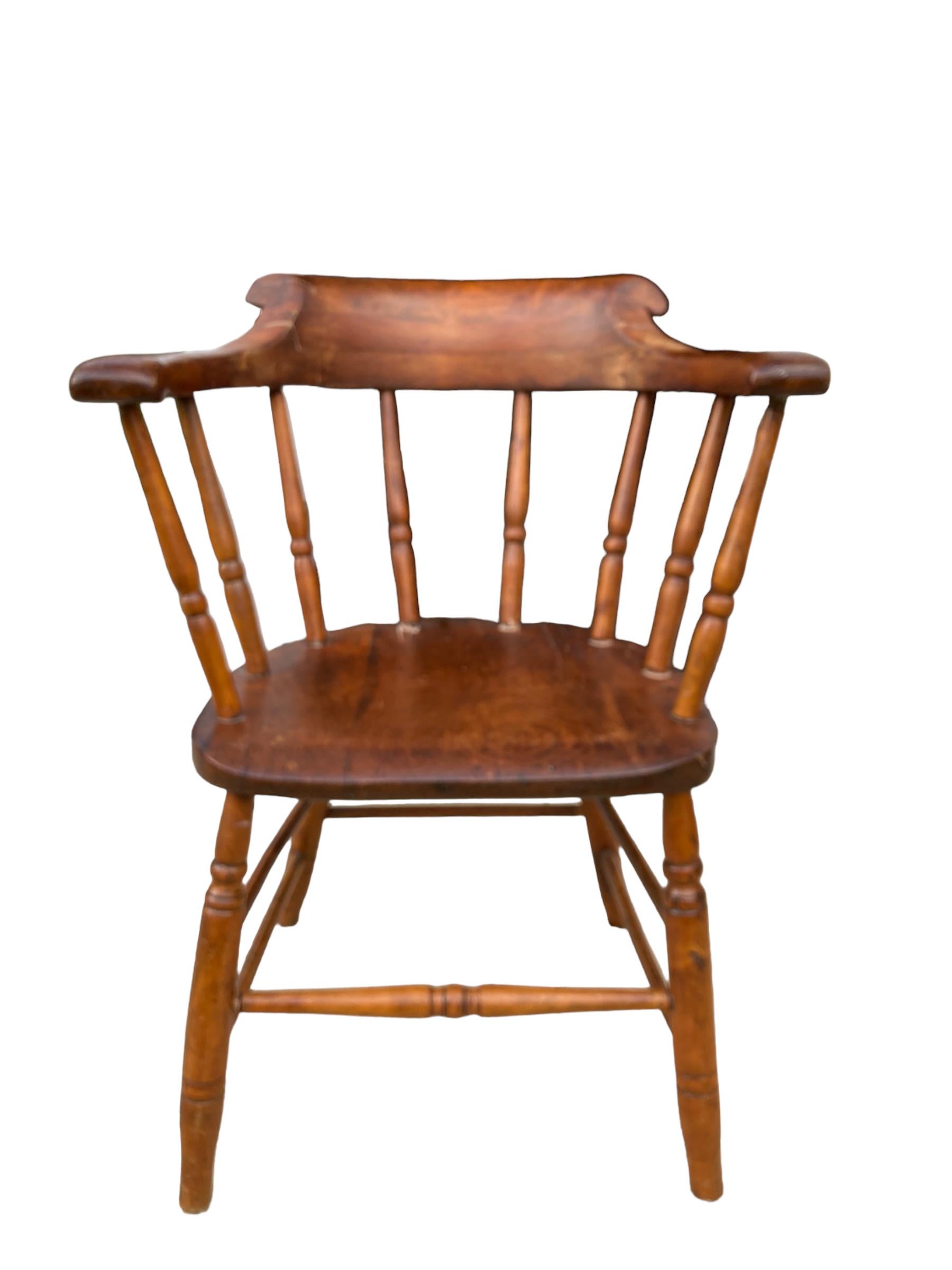 antique wooden captains chair