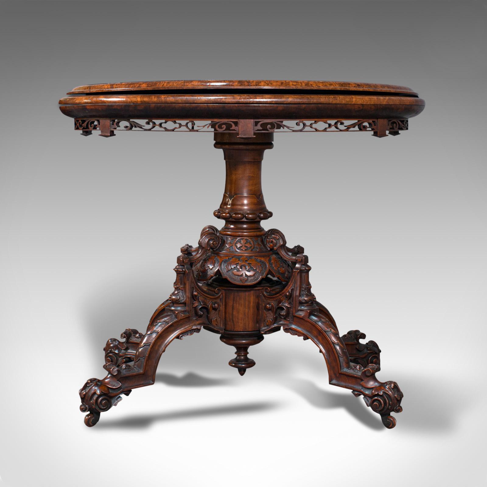 This is a striking antique card table. An English, book-matched walnut and boxwood inlay folding bridge games table, dating to the Victorian period, circa 1870.

Beautiful Victorian craftsmanship for the finest gentleman's lounge
Displaying a