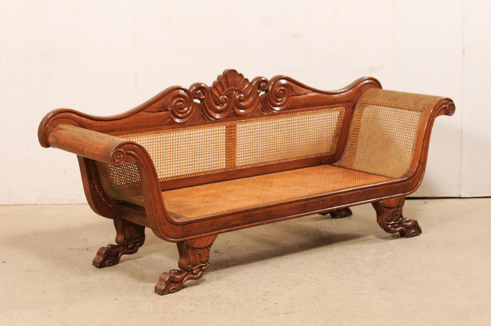 Antique Caribbean Regency Carved Wood and Hand Caned Sofa w/ Shell & Wave Crest In Good Condition For Sale In Atlanta, GA