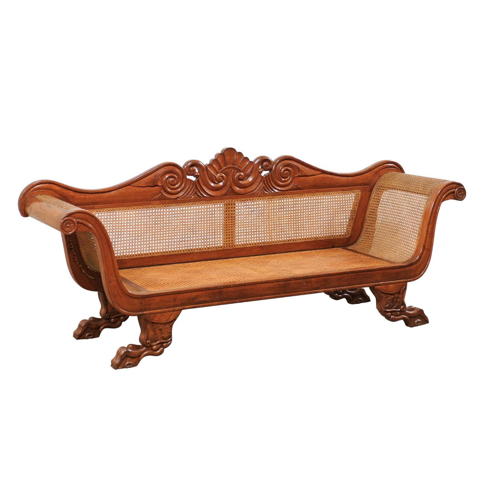 Antique Caribbean Regency Carved Wood and Hand Caned Sofa w/ Shell & Wave Crest For Sale