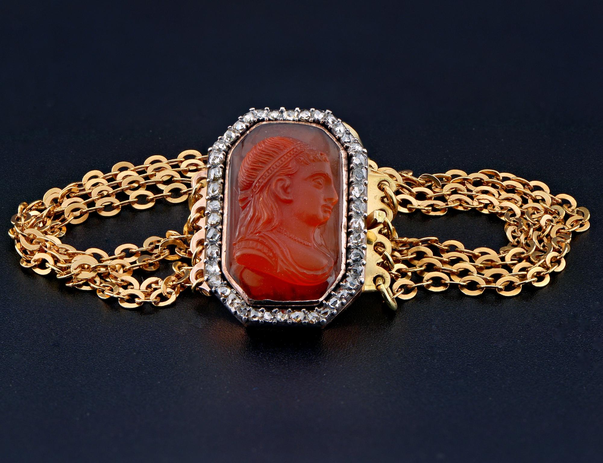 The octagonal clasp is set with Carnelian cameo skillful carving depicting the bust of a neoclassical lady, within a border of rose cut Diamonds giving out lovely sparkle and white twinkling Diamond light – approx .60 Ct of Diamond content
Dates