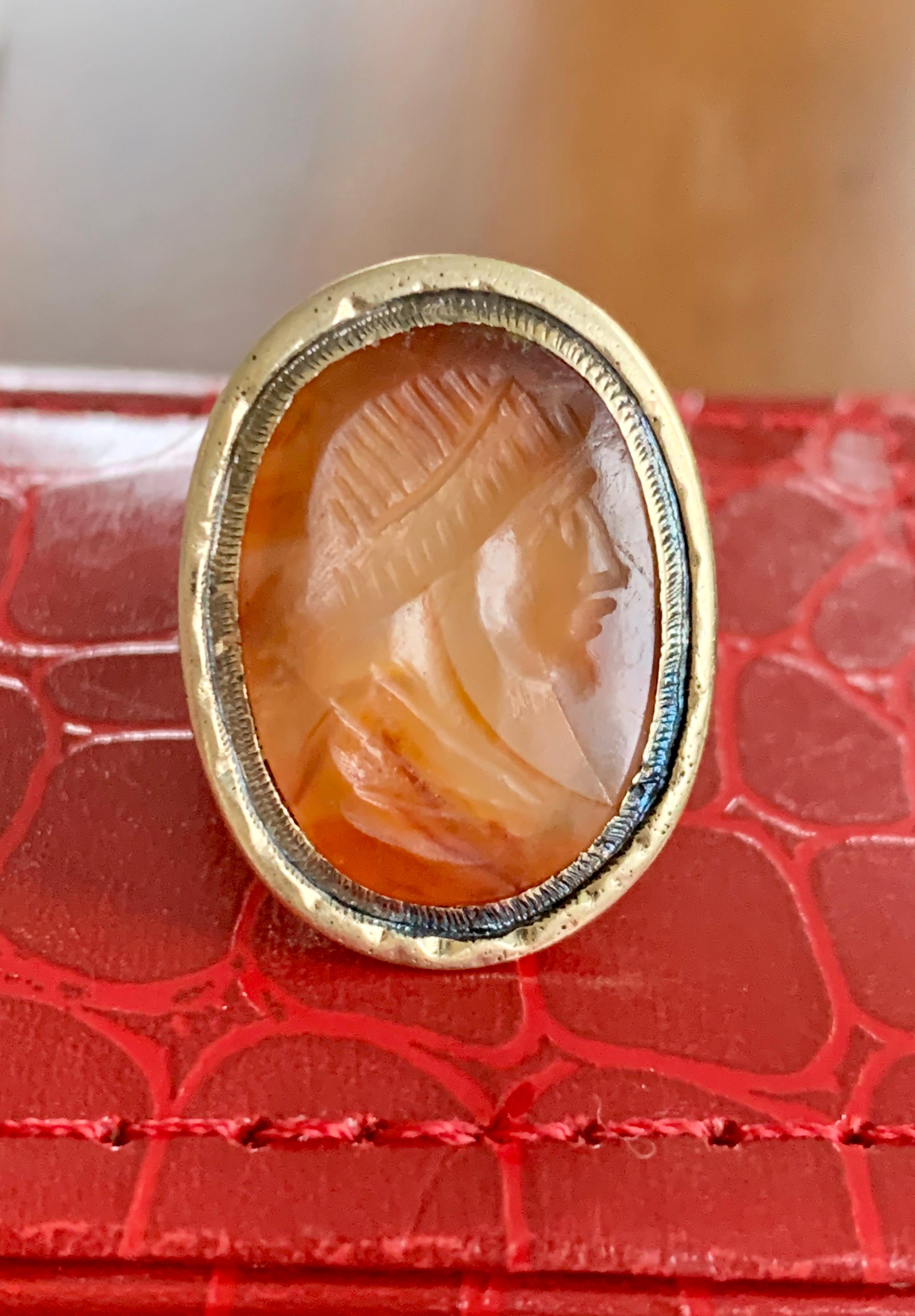 This 10 karat yellow Gold ring features and 14 x 20mm Carnelian Intaglio.  Carnelian is such a lovely stone, not seen often in modern jewelry.  It was very popular in the early 1990's and is the featured stone in many types of vintage