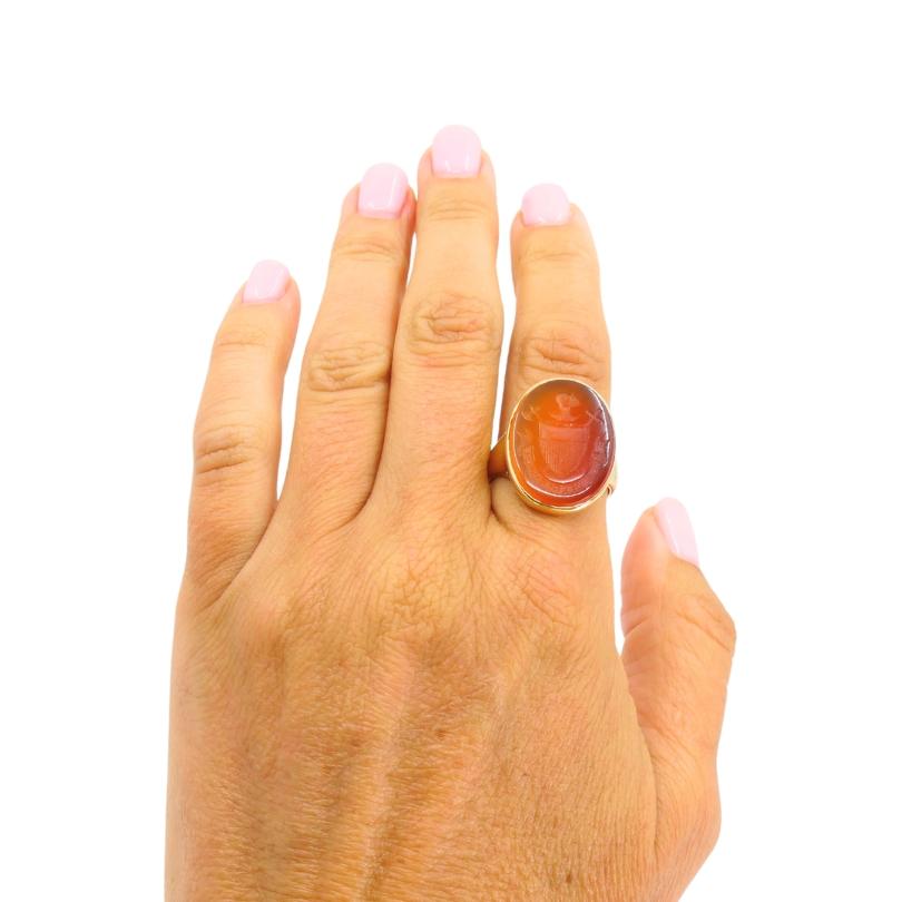 DESIGNER: Unknown
MATERIALS: 18k Yellow Gold
GEMSTONE: Carnelian
WEIGHT: 8.4 Grams
RING SIZE: 9
MEASUREMENTS: Stone - 5/8