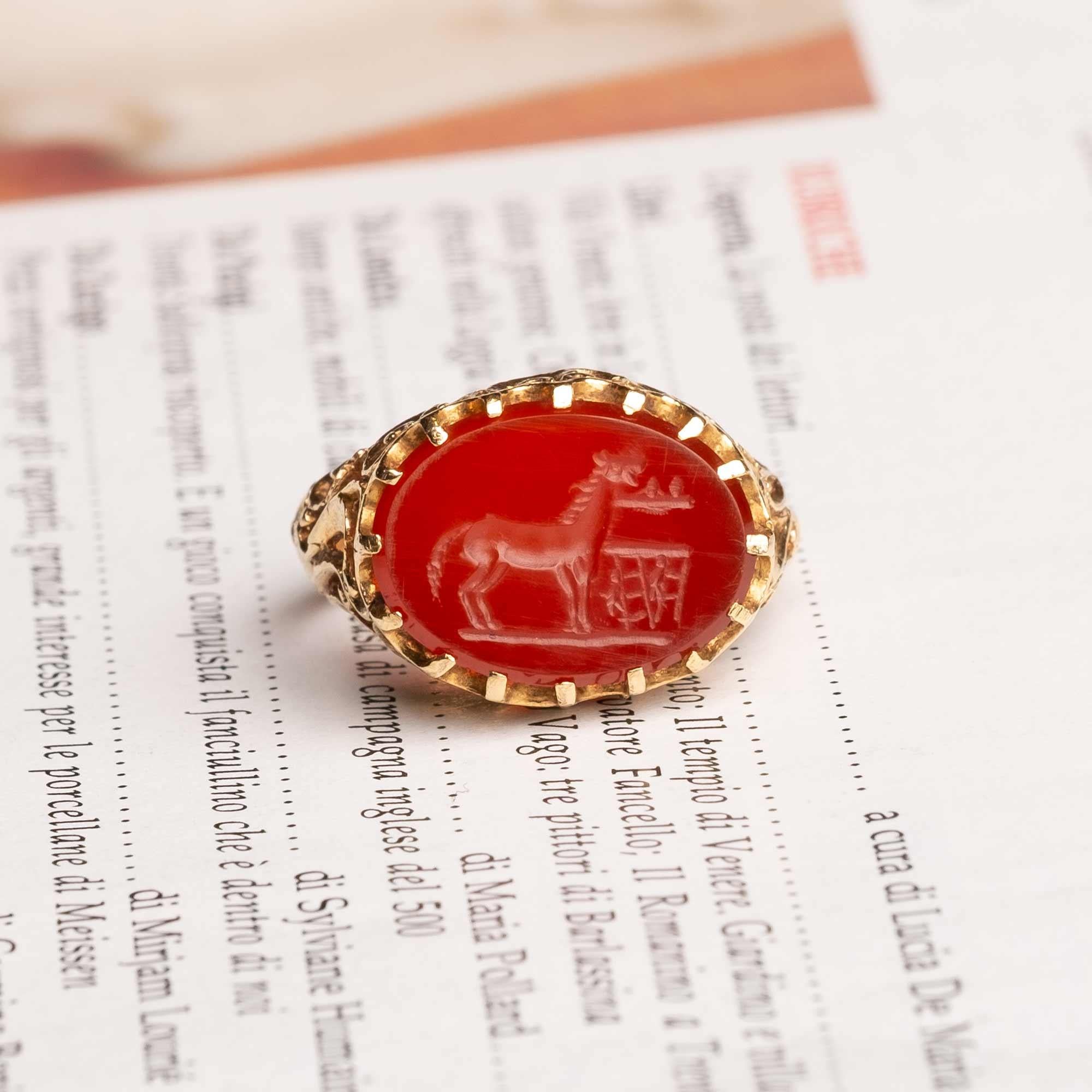 Antique carnelian intaglio gold (18ct) ring. Setting finely hand made and carnelian intaglio depicting a horse. Probably from the early 1900s.

Highlights
- 18ct gold hand made
- Carnelian intaglio depicting a horse
- 1900s period

Measurements
-