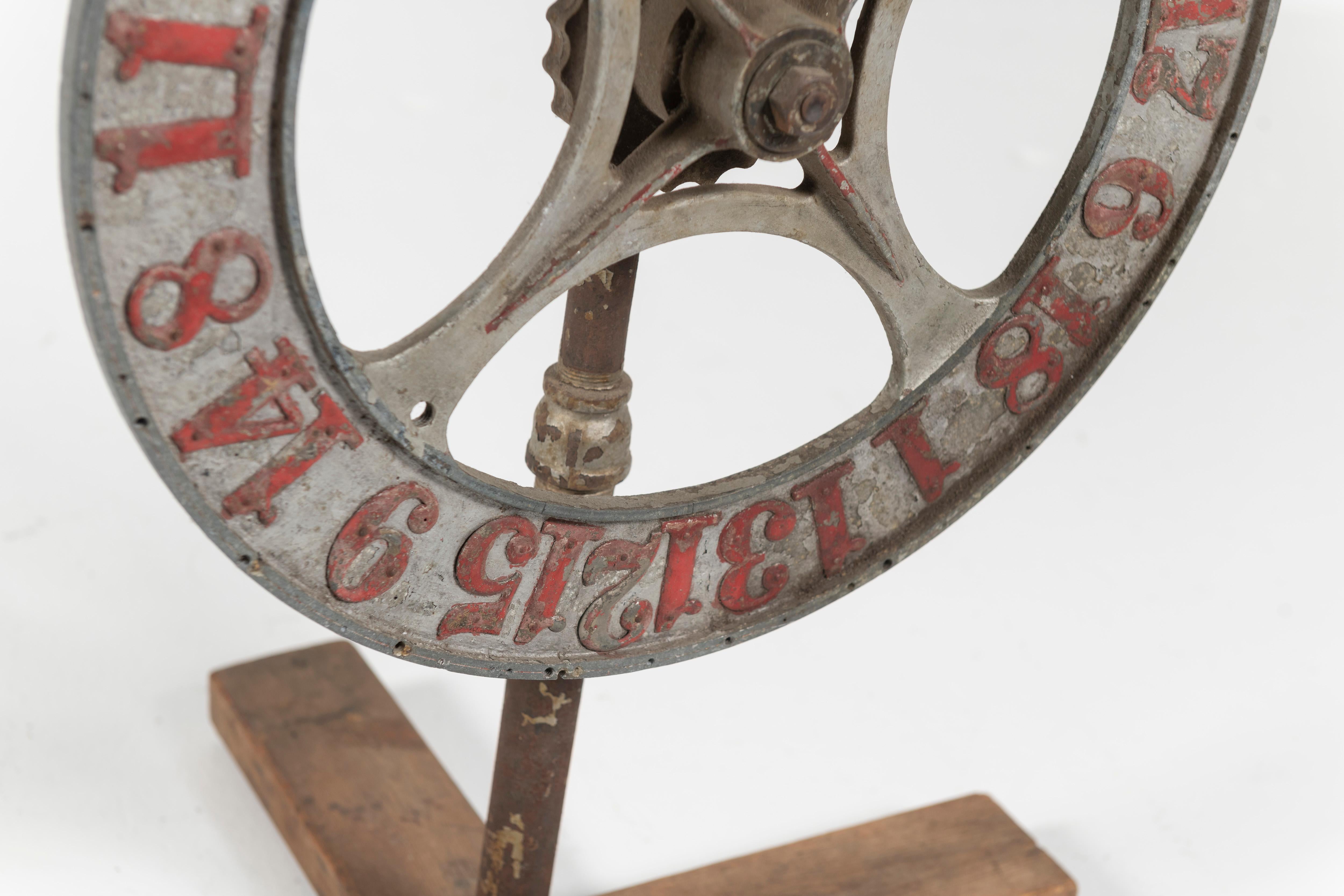 Roulette originated in France and was brought to the United States, specifically New Orleans,  in the late 18th Century. This antique metal gaming wheel with red painted number, is a great addition to your casino room or prop for your upcoming film
