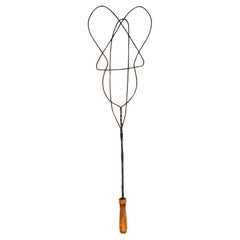 Antico battitappeto a forma di chitarra, Regno Unito, fine del 1800.