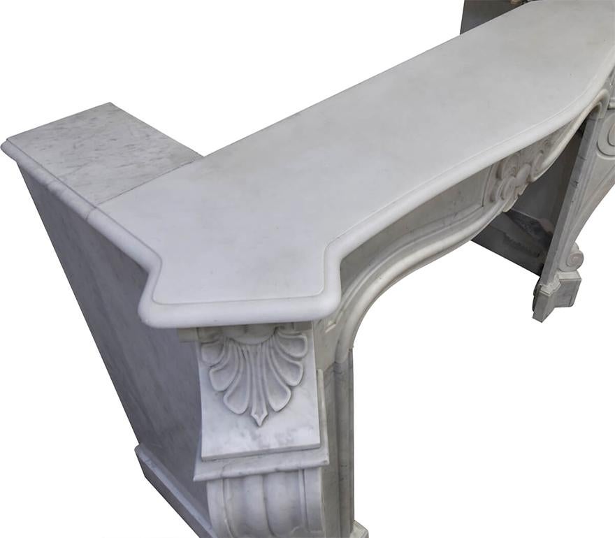 Late 19th Century Antique Carrara marble fireplace mantel type Louis XV For Sale