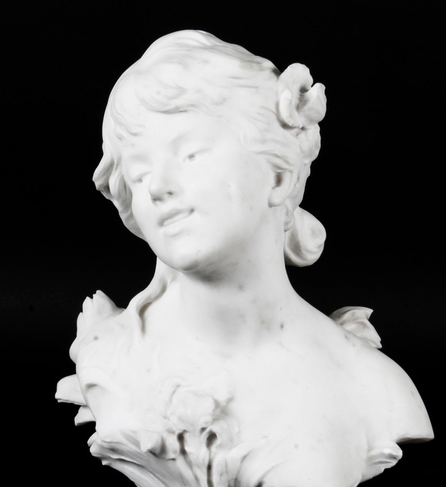 This is beautiful antique French marble shoulder length bust of a beautiful maiden, signed Auguste Moreau, circa 1890 in date.
The face and body has been sensitively modelled in Carrara marble with her head tilted to the right, her loose hair