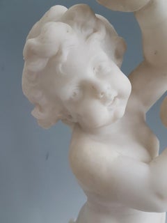 Antique Carrera Marble of a Dancing Putti playing Cymbals after Clodion
