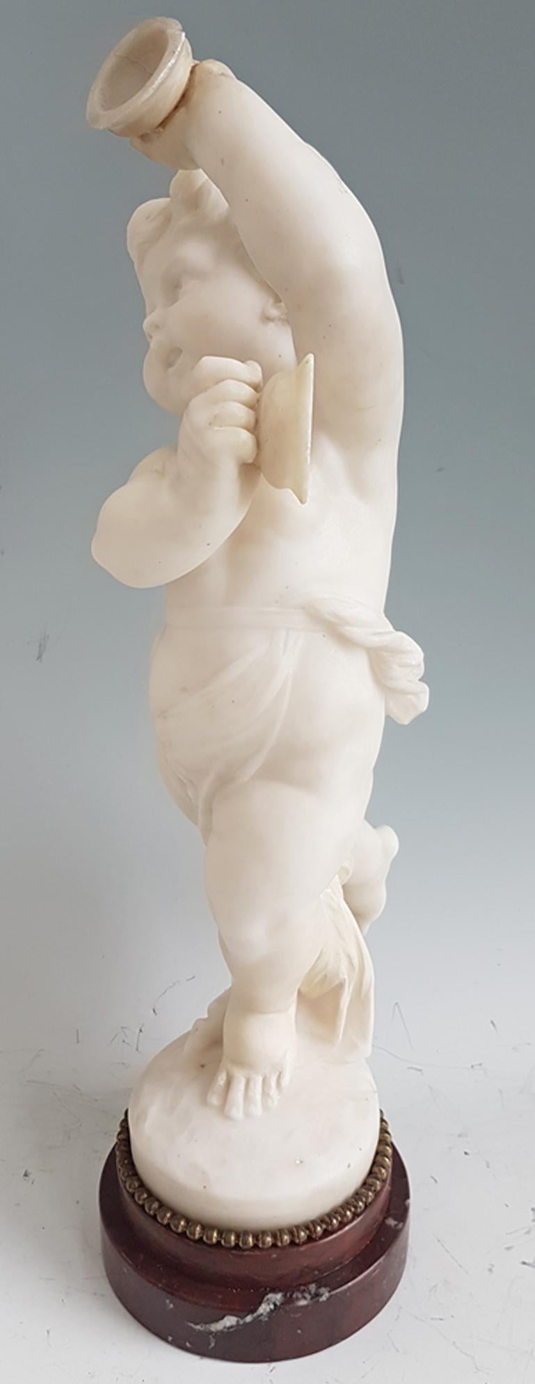 Gilt Antique Carrera Marble of a Dancing Putti playing Cymbals after Clodion For Sale
