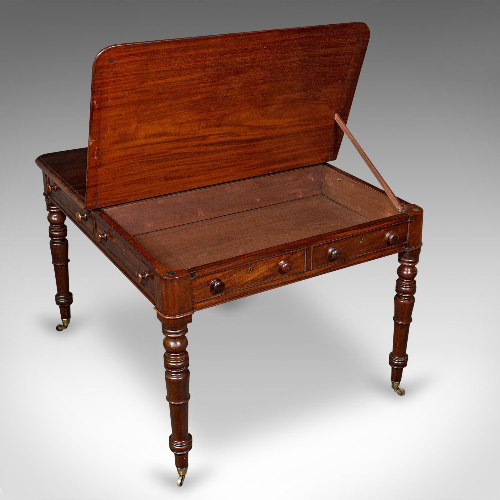 This is an antique cartographer's folio table. An English, mahogany lift over library table or desk, dating to the Georgian period, circa 1800.

Rare and unusual, this fascinating table presents a fine appearance and versatility
Displays a