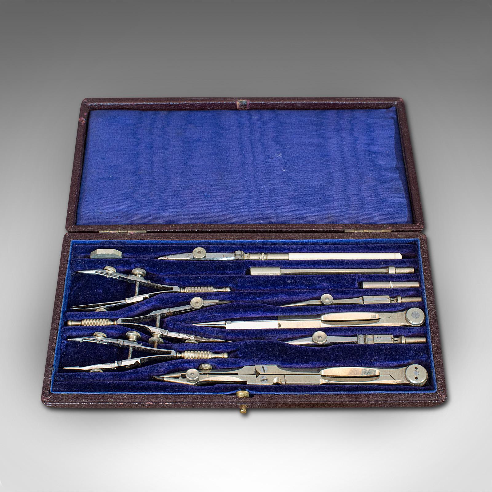 This is an antique cartographer's instrument set. An English, silver nickel surveyor's tool case, dating to the early 20th century, circa 1920.

An attractive early 20th century set
Displays a desirable aged patina
Silver nickel instruments in