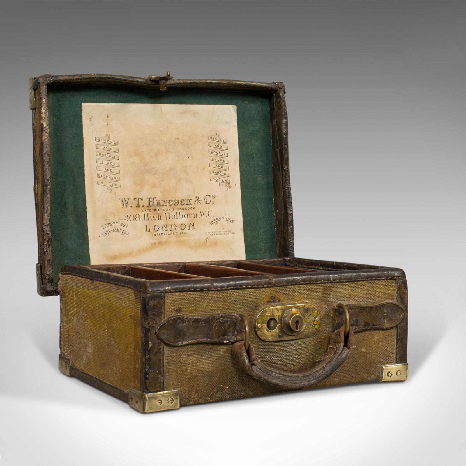 This is an antique cartridge case. An English, leather-bound canvas personal sporting trunk, dating to the Victorian period circa 1890.

A fascinating Victorian past-time piece
Displays a desirable aged patina
Olive coloured canvas over wooden