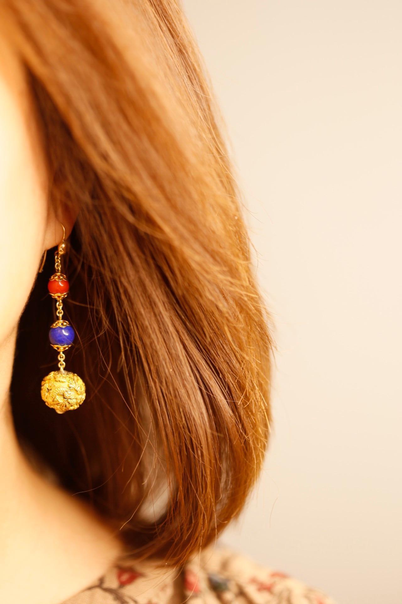 Antique Carved 18K Gold, Coral and Lapis Drop Earrings bursting with vivid colours and timeless style


The phenomenal antique carved 18K yellow gold beads have such a unique and fine detailing. This lures you in for a closer look. The earrings