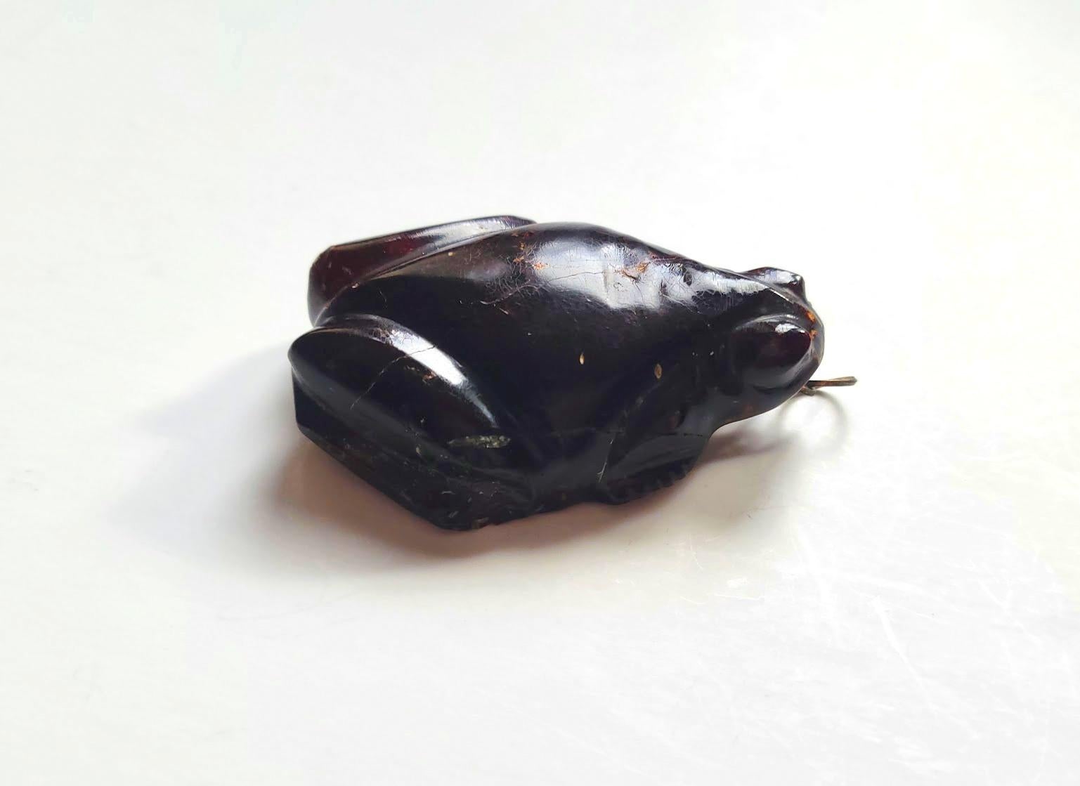 What an absolutely amazing, very unusual antique carved amber figural frog pendant for a necklace. Japanese artifact!
The color of amber is saturated tea with a cherry tint! Very valuable! The color is authentic and natural. This frog consists of