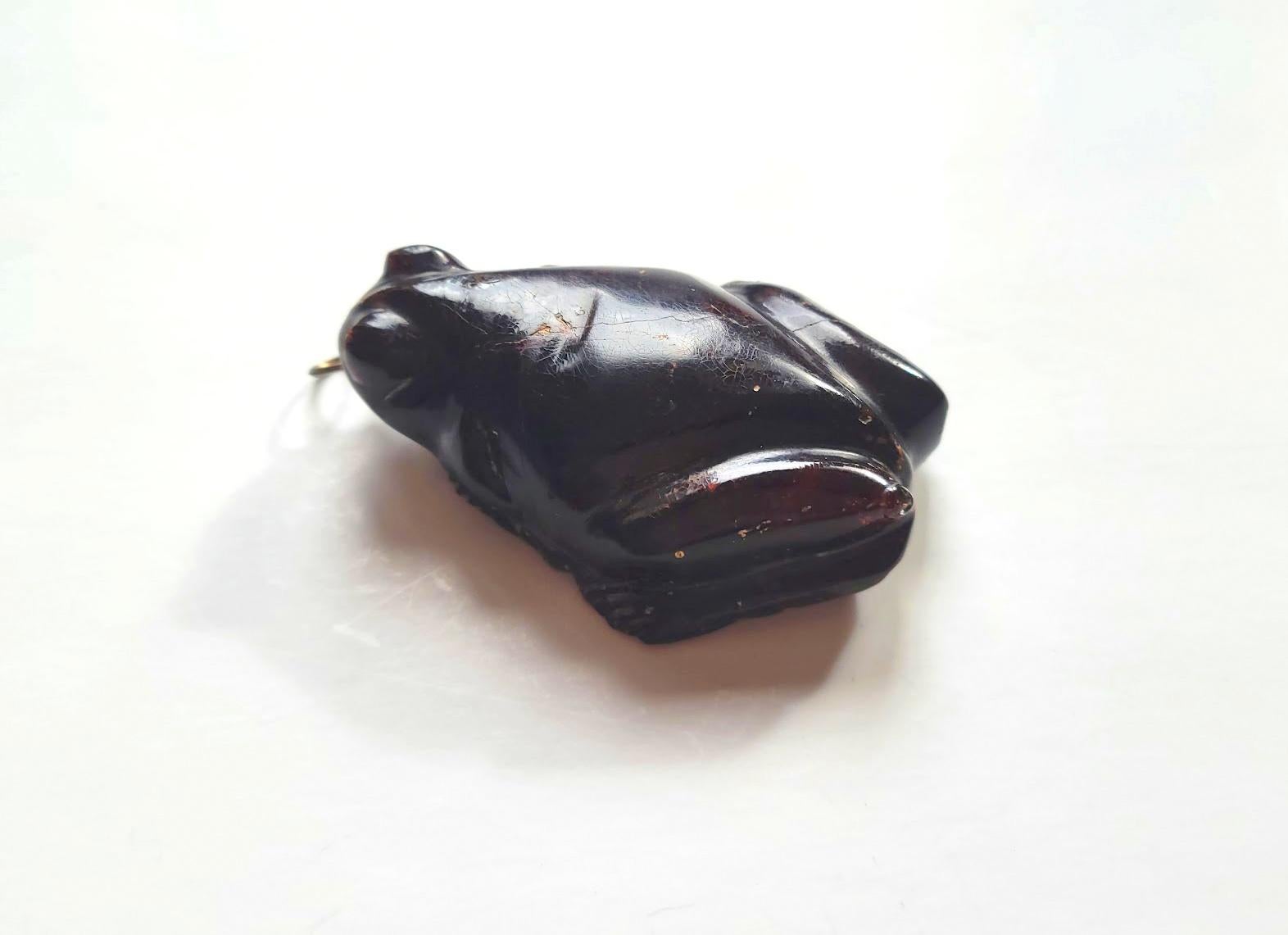 Mixed Cut Antique Carved Amber Frog Pendant For Sale